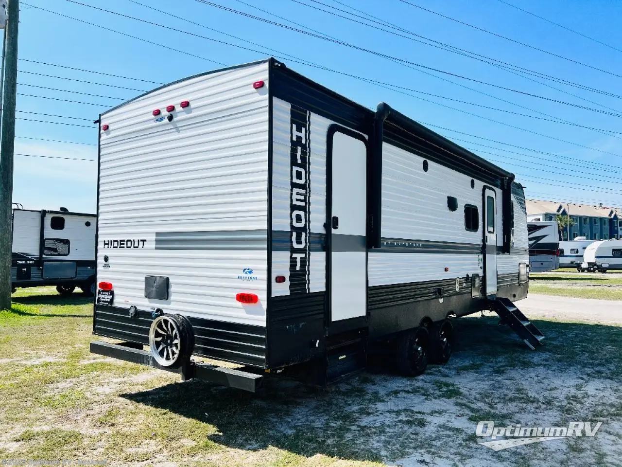Call now about this 2022 Keystone Hideout 272BH! 2022 Keystone Hideout 272BH - Used Travel Trailer For Sale by Optimum RV - Bushnell in Bushnell, Florida features Slideout, Awning