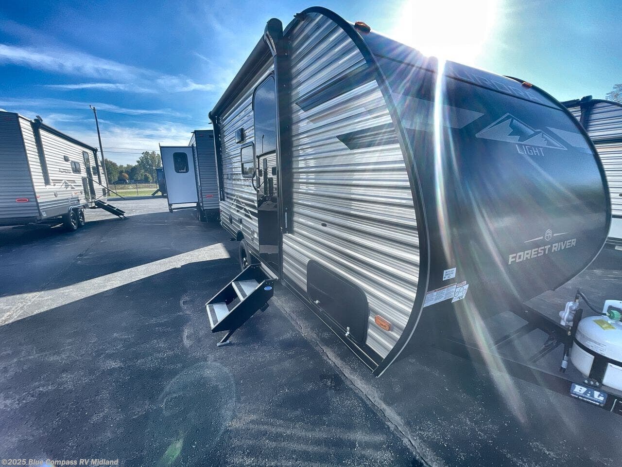 Contact us now about this 2026 Forest River Aurora Light 16BHX! 2026 Aurora Light 16BHX by Forest River from Blue Compass RV Midland in Midland, Michigan