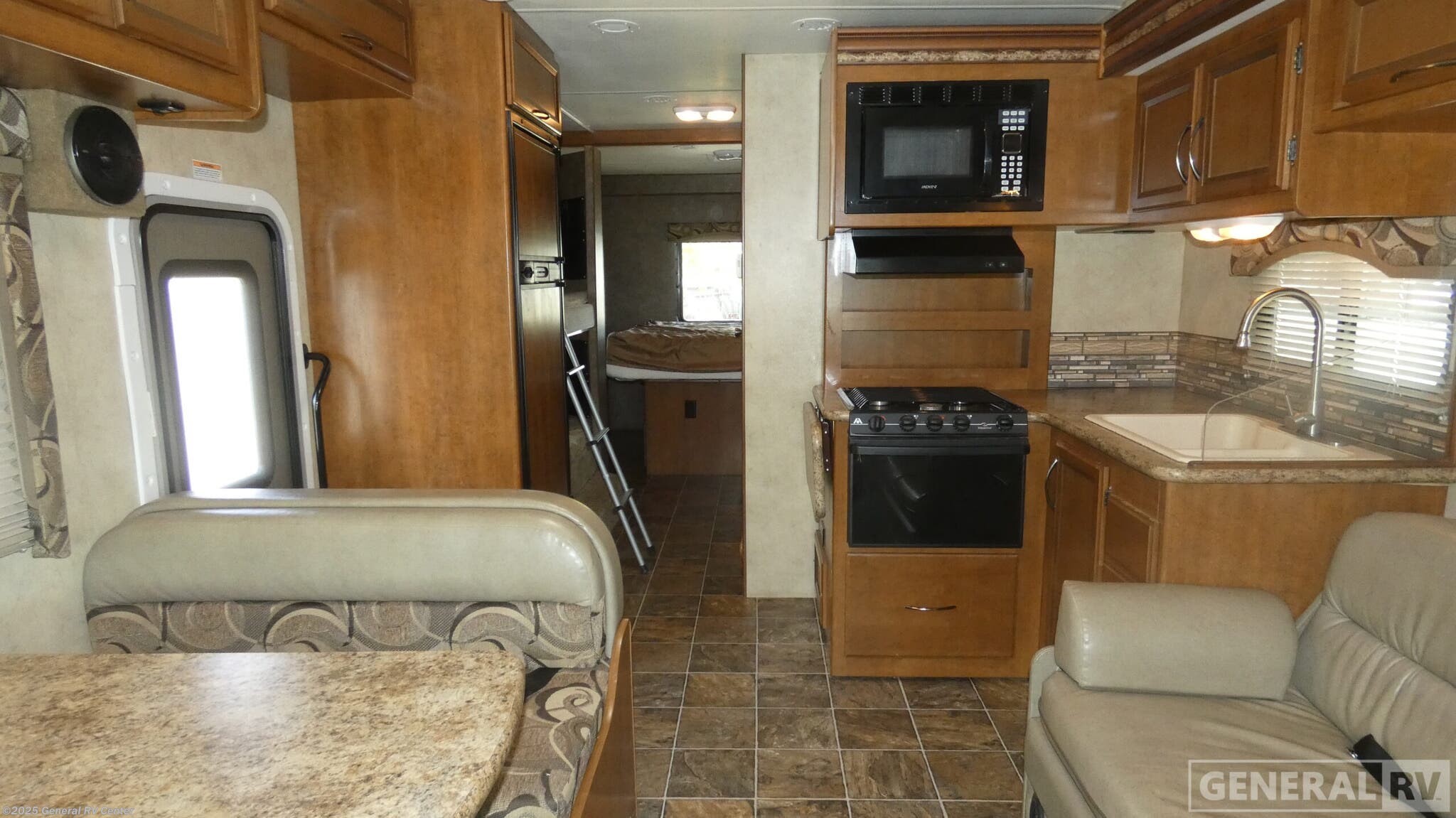Call now about this 2013 Thor Motor Coach Four Winds 31A! 2013 Thor Motor Coach Four Winds 31A - Used Class C For Sale by General RV Center in Clarkston, Michigan