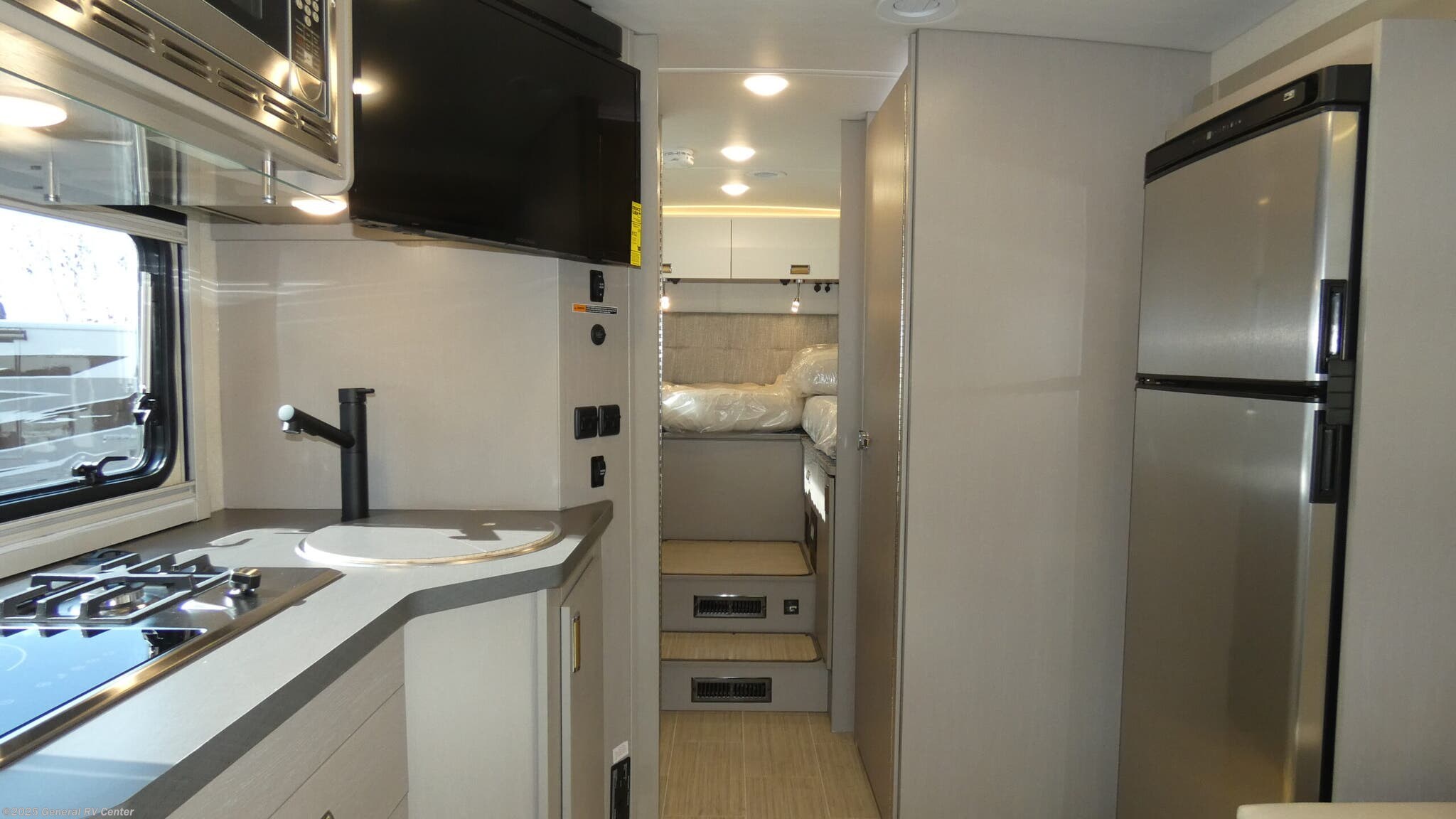 Call now about this 2026 Winnebago Navion 24R! 2026 Winnebago Navion 24R - New Class C For Sale by General RV Center in Dover, Florida