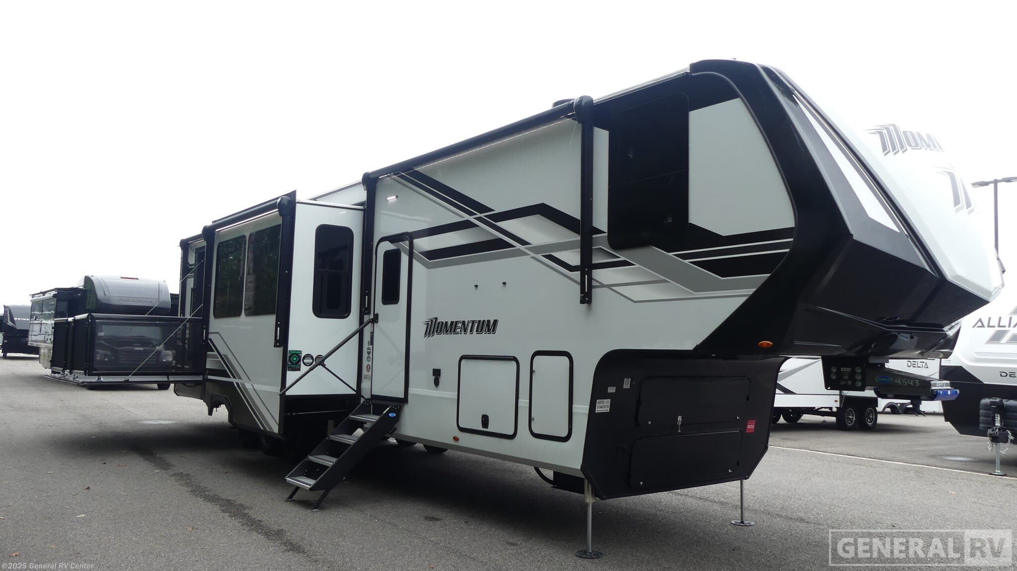 Email now about this 2026 Grand Design Momentum M-Class 399M! New 2026 Grand Design Momentum M-Class 399M available in Ashland, Virginia