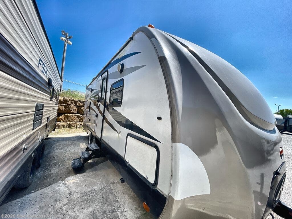 Call now about this 2015 Keystone Laredo 23RB! 2015 Keystone Laredo 23RB - Used Travel Trailer For Sale by Blue Compass RV Kansas City in Grain Valley, Missouri