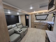 Call now about this 2025 Palomino Solaire 2300FKBS! 2025 Palomino Solaire 2300FKBS - New Travel Trailer For Sale by Roughin' It Inc in Madison, Ohio