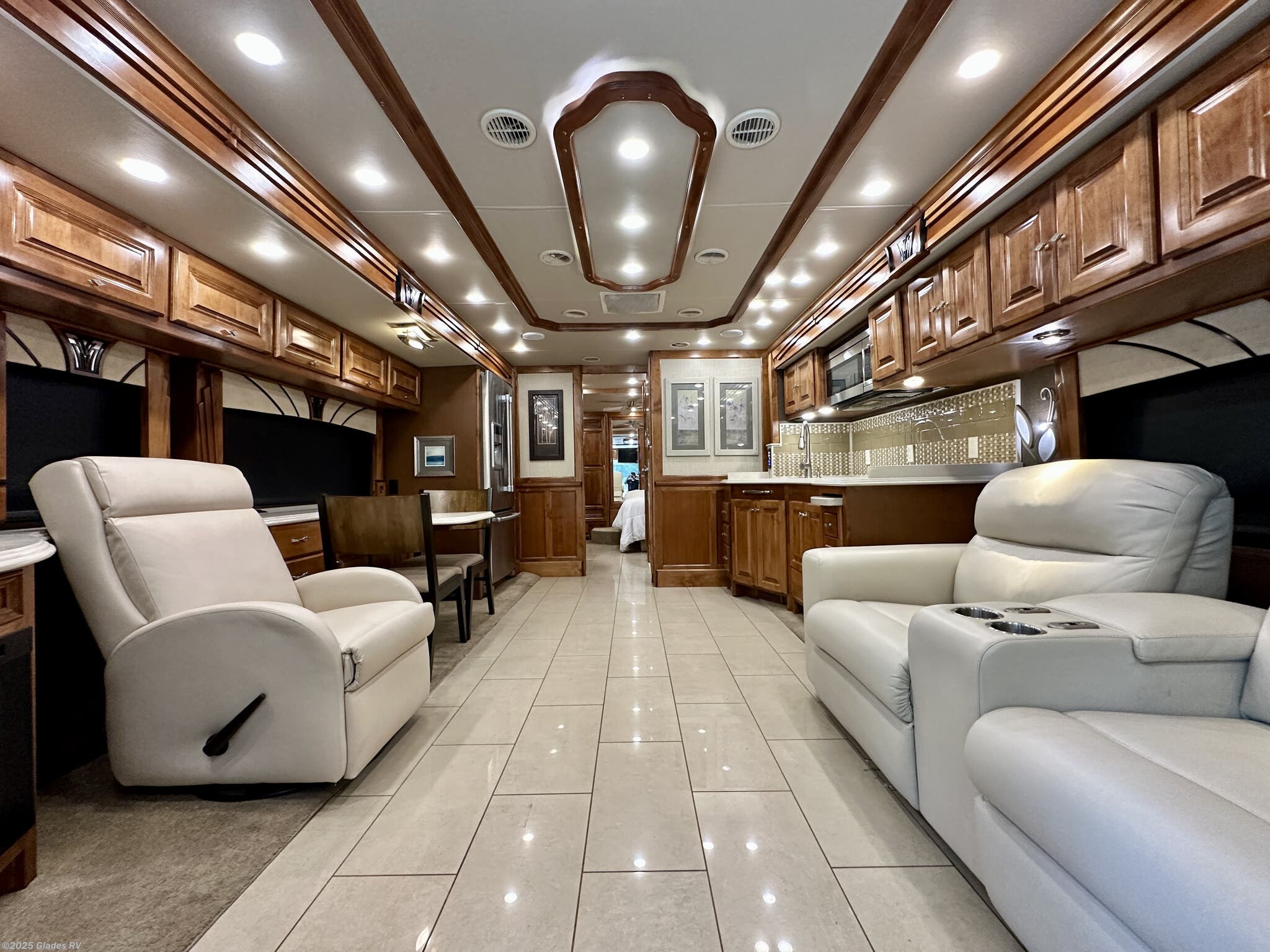 Call now about this 2016 Tiffin Phaeton 36 GH! 2016 Tiffin Phaeton 36 GH - Used Diesel Pusher For Sale by Glades RV in Fort Myers, Florida features Power Awning, 50 Amp Service, Automatic Leveling Jacks, Dryer, Residential Refrigerator