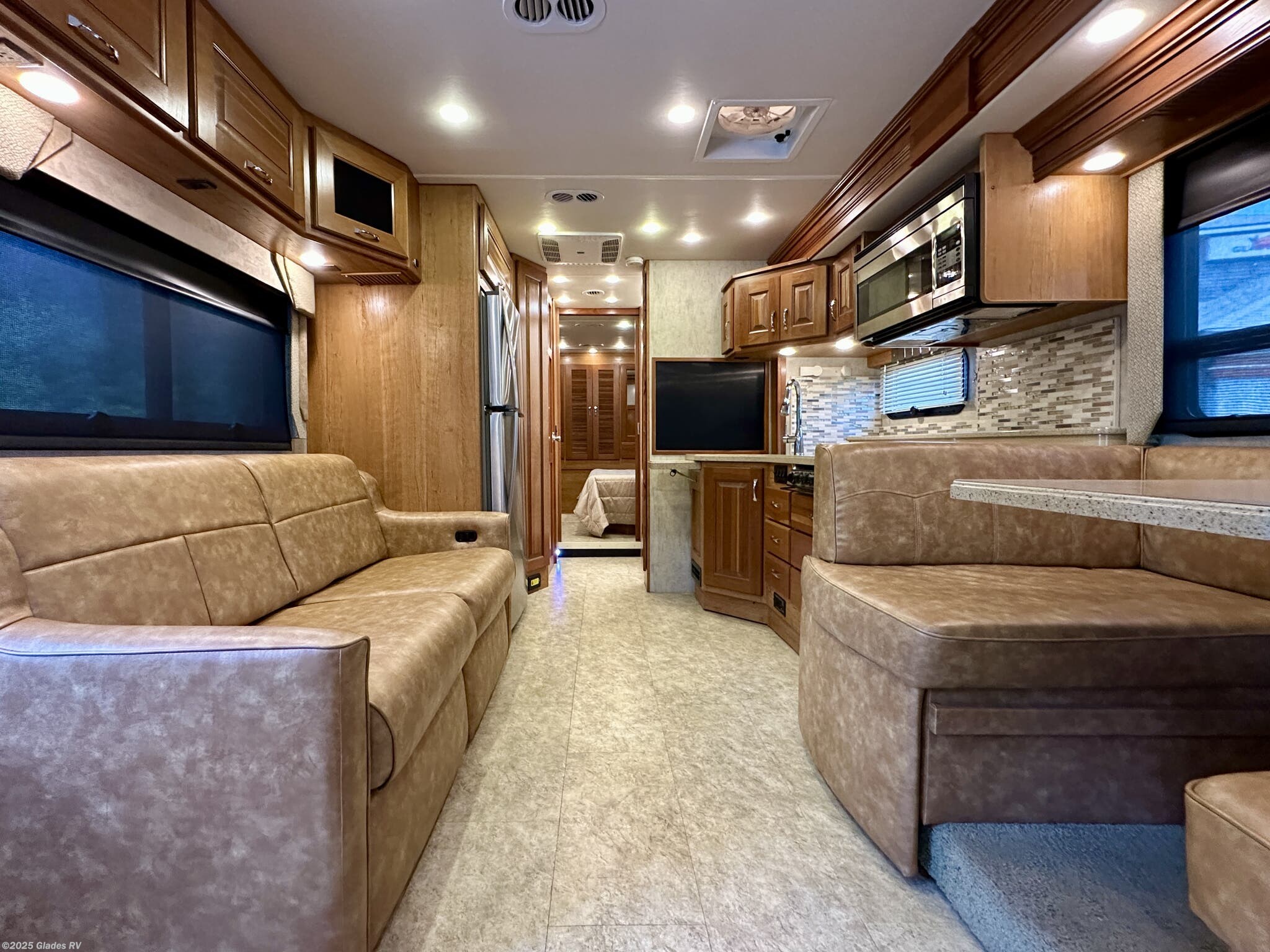 Call now about this 2016 Fleetwood Excursion 33D! 2016 Fleetwood Excursion 33D - Used Diesel Pusher For Sale by Glades RV in Fort Myers, Florida features Power Entrance Step, Second Roof A/C, Power Awning, Automatic Leveling Jacks, Full Body Paint