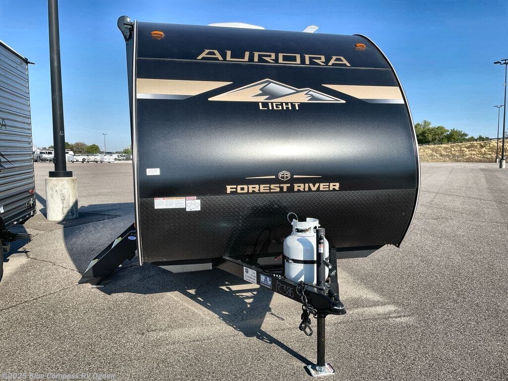 Contact us now about this 2026 Forest River Aurora Light 13RDX! 2026 Aurora Light 13RDX by Forest River from Blue Compass RV Ogden in Marriott-Slaterville, Utah
