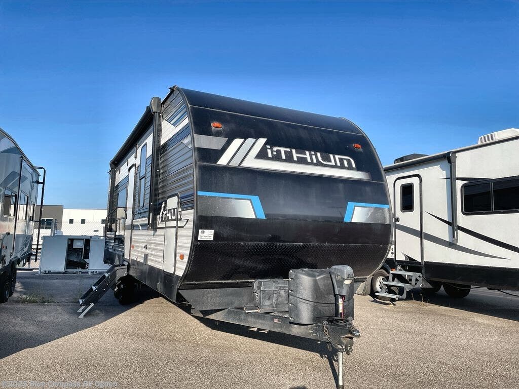 Call now about this 2023 Heartland Lithium 2515 s! 2023 Heartland Lithium 2515 s - Used Travel Trailer For Sale by Blue Compass RV Ogden in Marriott-Slaterville, Utah