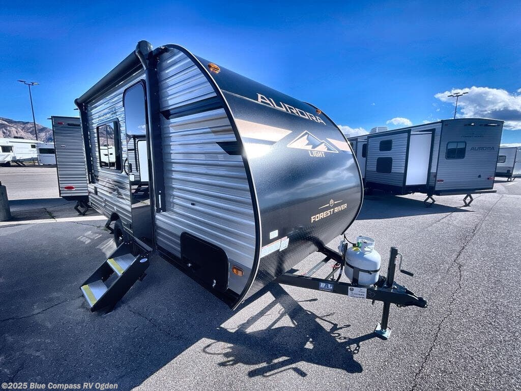 Contact us now about this 2026 Forest River Aurora Light 15RBX! 2026 Aurora Light 15RBX by Forest River from Blue Compass RV Ogden in Marriott-Slaterville, Utah