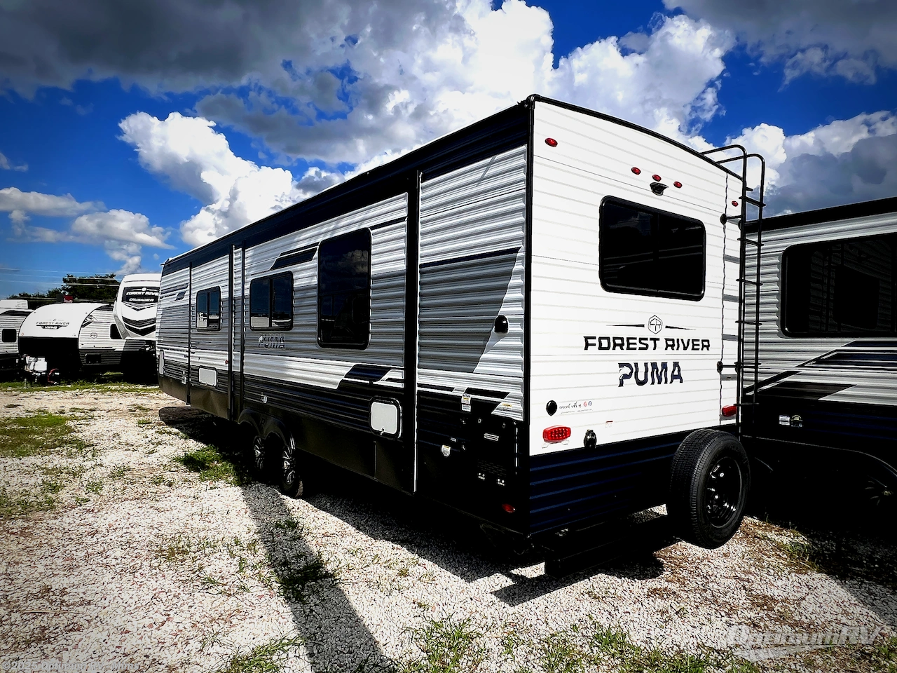 Call now about this 2026 Forest River Puma 310RK! 2026 Forest River Puma 310RK - New Travel Trailer For Sale by Optimum RV - Mims in Mims, Florida features Awning, Slideout