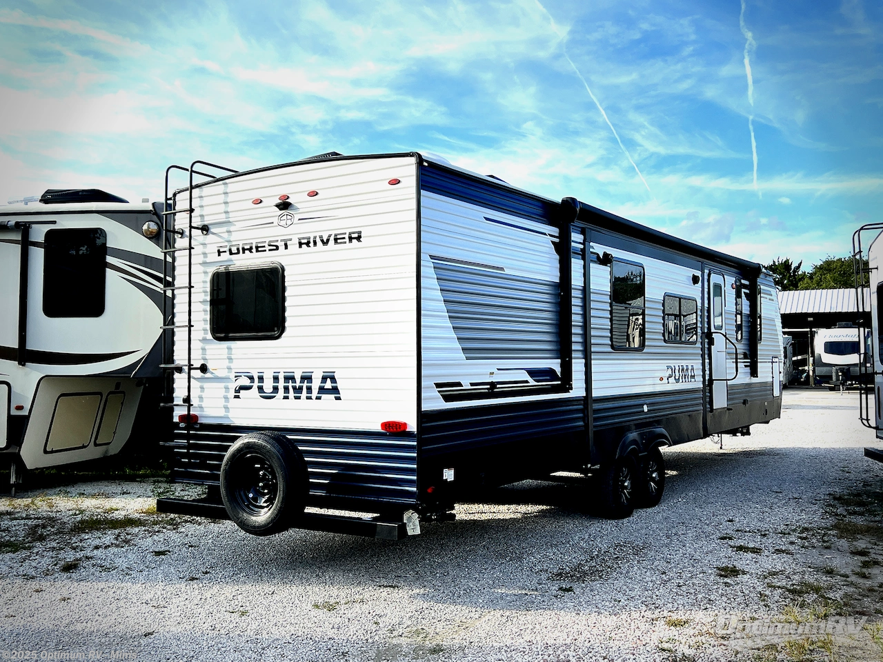 Call now about this 2026 Forest River Puma 340DB! 2026 Forest River Puma 340DB - New Travel Trailer For Sale by Optimum RV - Mims in Mims, Florida features Slideout, Awning
