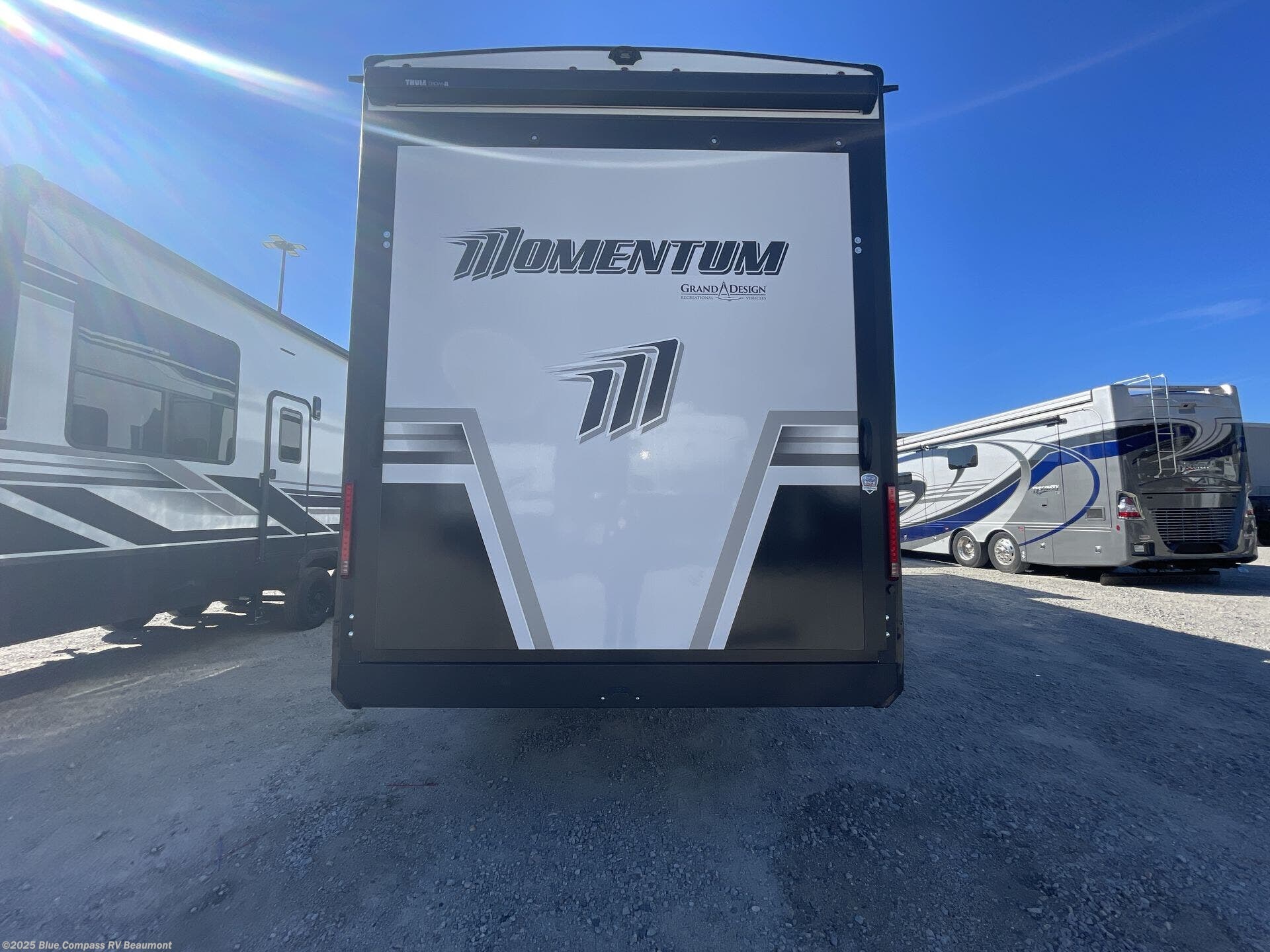 Contact us now about this 2026 Grand Design Momentum 395MT! 2026 Momentum 395MT by Grand Design from Blue Compass RV Beaumont in Vidor, Texas