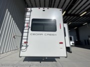 Contact us now about this 2023 Forest River Cedar Creek 377BH! 2023 Cedar Creek 377BH by Forest River from Blue Compass RV Charleston in Ladson, South Carolina