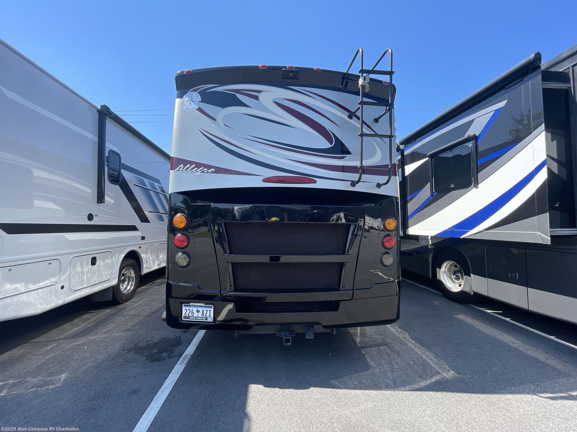 Contact us now about this 2013 Tiffin Allegro Breeze 32 BR! 2013 Allegro Breeze 32 BR by Tiffin from Blue Compass RV Charleston in Ladson, South Carolina