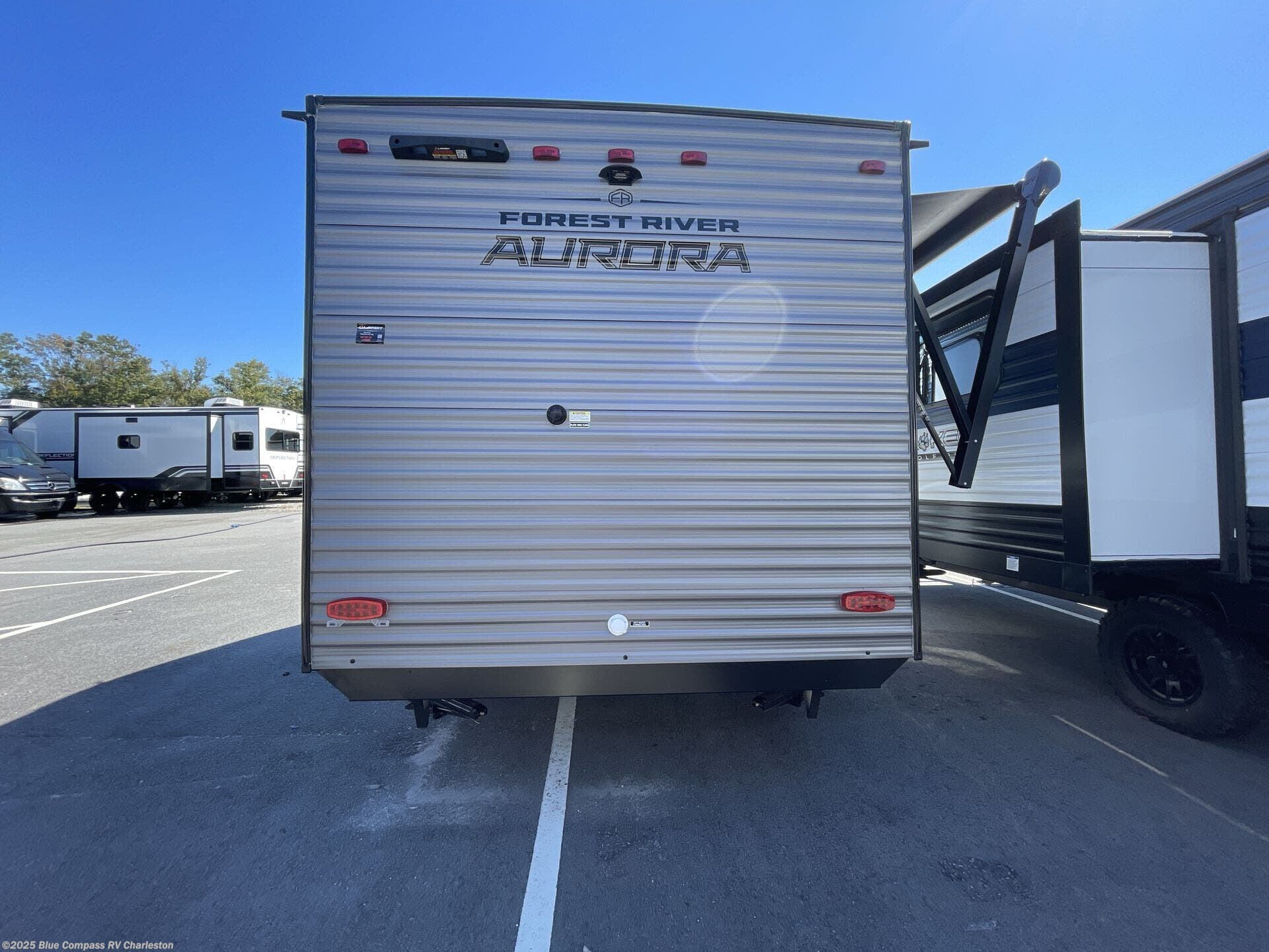 Contact us now about this 2026 Forest River Aurora Light 13RDX! 2026 Aurora Light 13RDX by Forest River from Blue Compass RV Charleston in Ladson, South Carolina