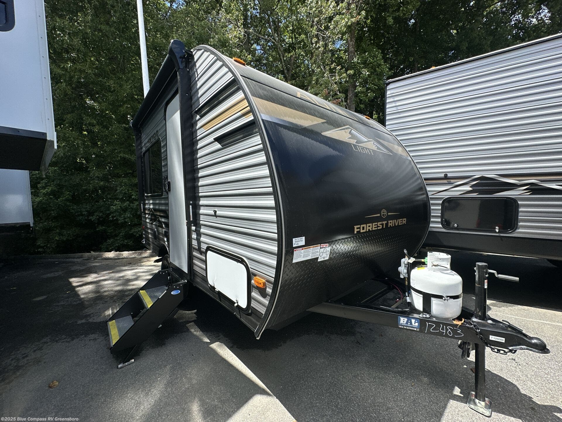 Contact us now about this 2026 Forest River Aurora Light 13RDX! 2026 Aurora Light 13RDX by Forest River from Blue Compass RV Greensboro in Colfax, North Carolina