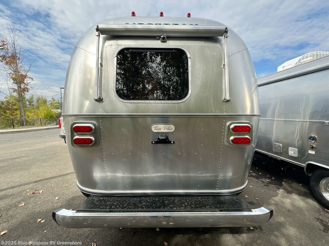Contact us now about this 2026 Airstream Trade Wind 23FB Twin! 2026 Trade Wind 23FB Twin by Airstream from Blue Compass RV Greensboro in Colfax, North Carolina