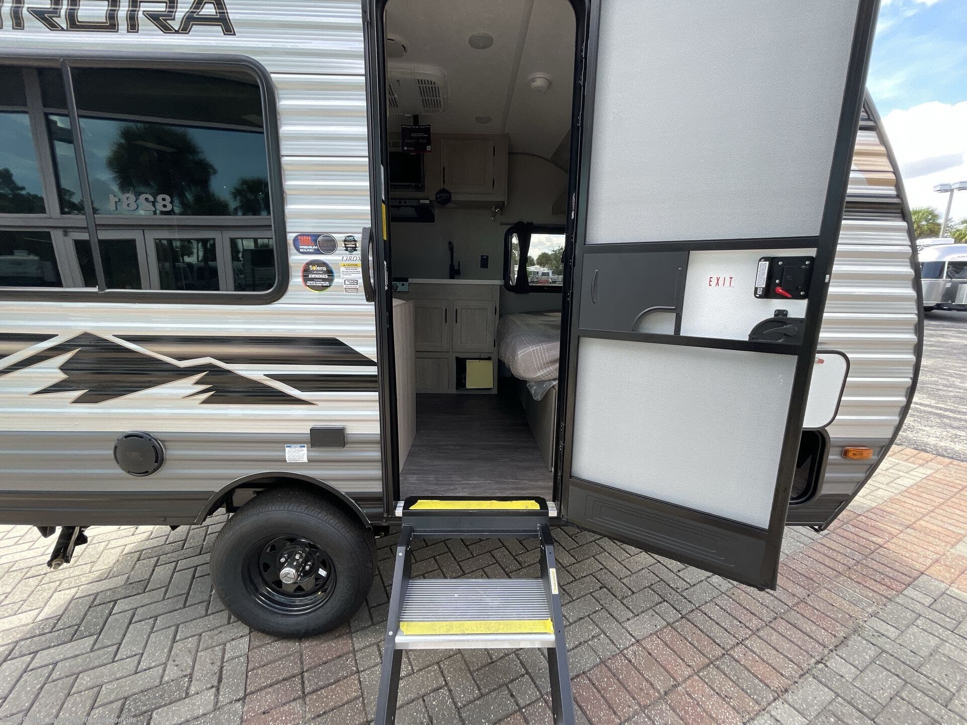 Contact us now about this 2026 Forest River Aurora Light 13RDX! 2026 Aurora Light 13RDX by Forest River from Blue Compass RV Jacksonville in Jacksonville, Florida