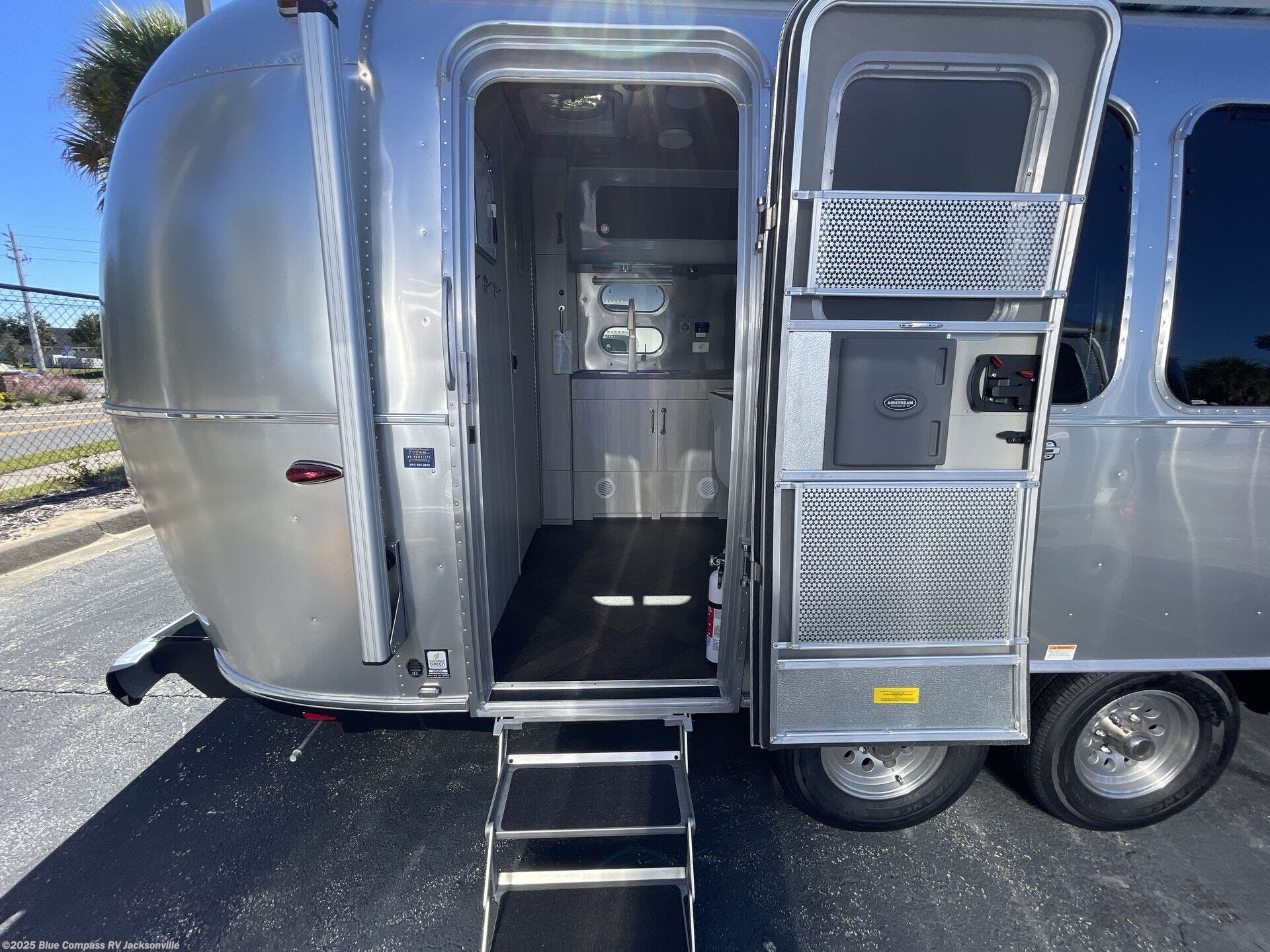 Contact us now about this 2026 Airstream International 23FB Twin! 2026 International 23FB Twin by Airstream from Blue Compass RV Jacksonville in Jacksonville, Florida