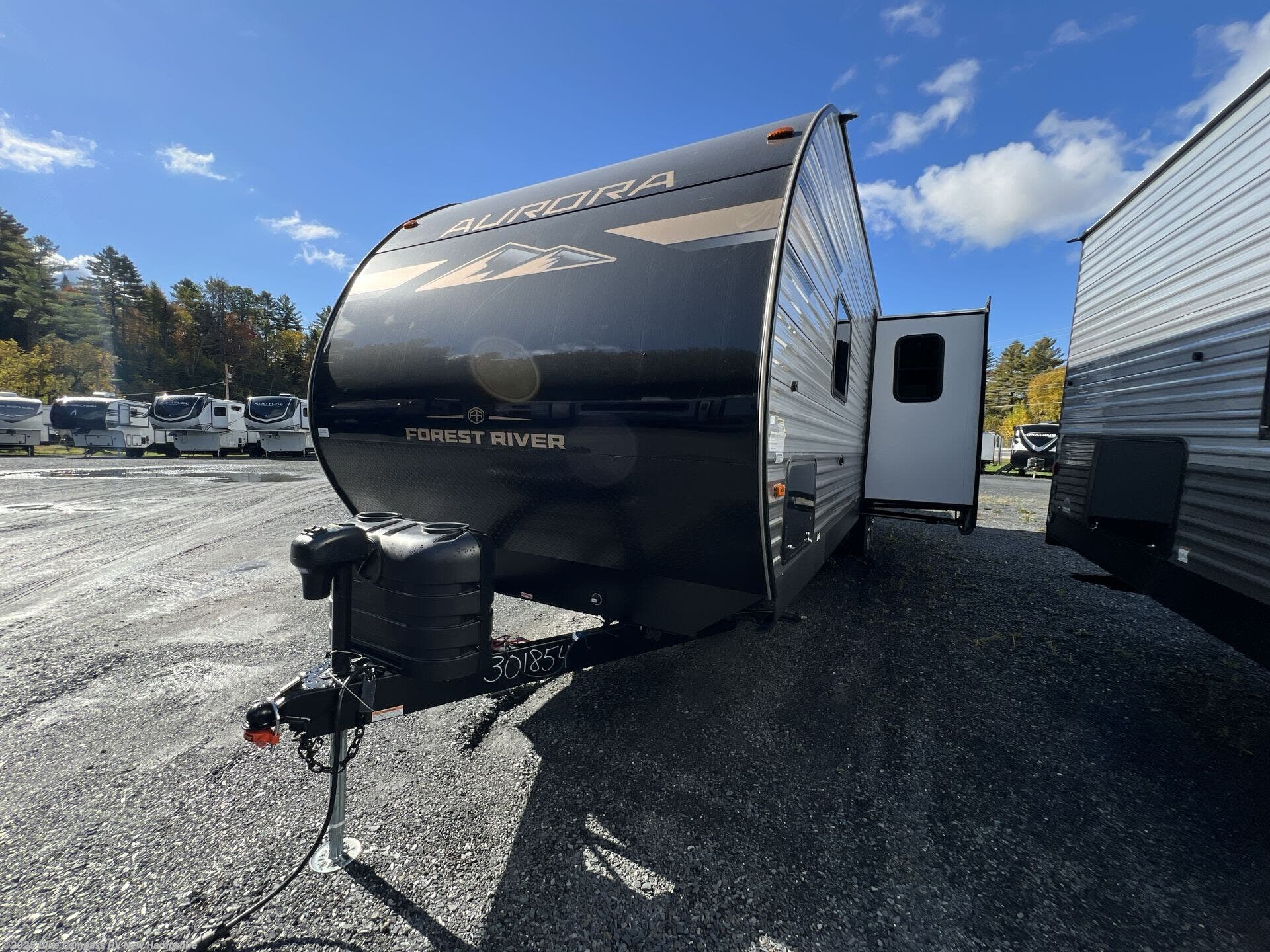Contact us now about this 2026 Forest River Aurora 29TQS! 2026 Aurora 29TQS by Forest River from Blue Compass RV New Hampshire in Epsom, New Hampshire