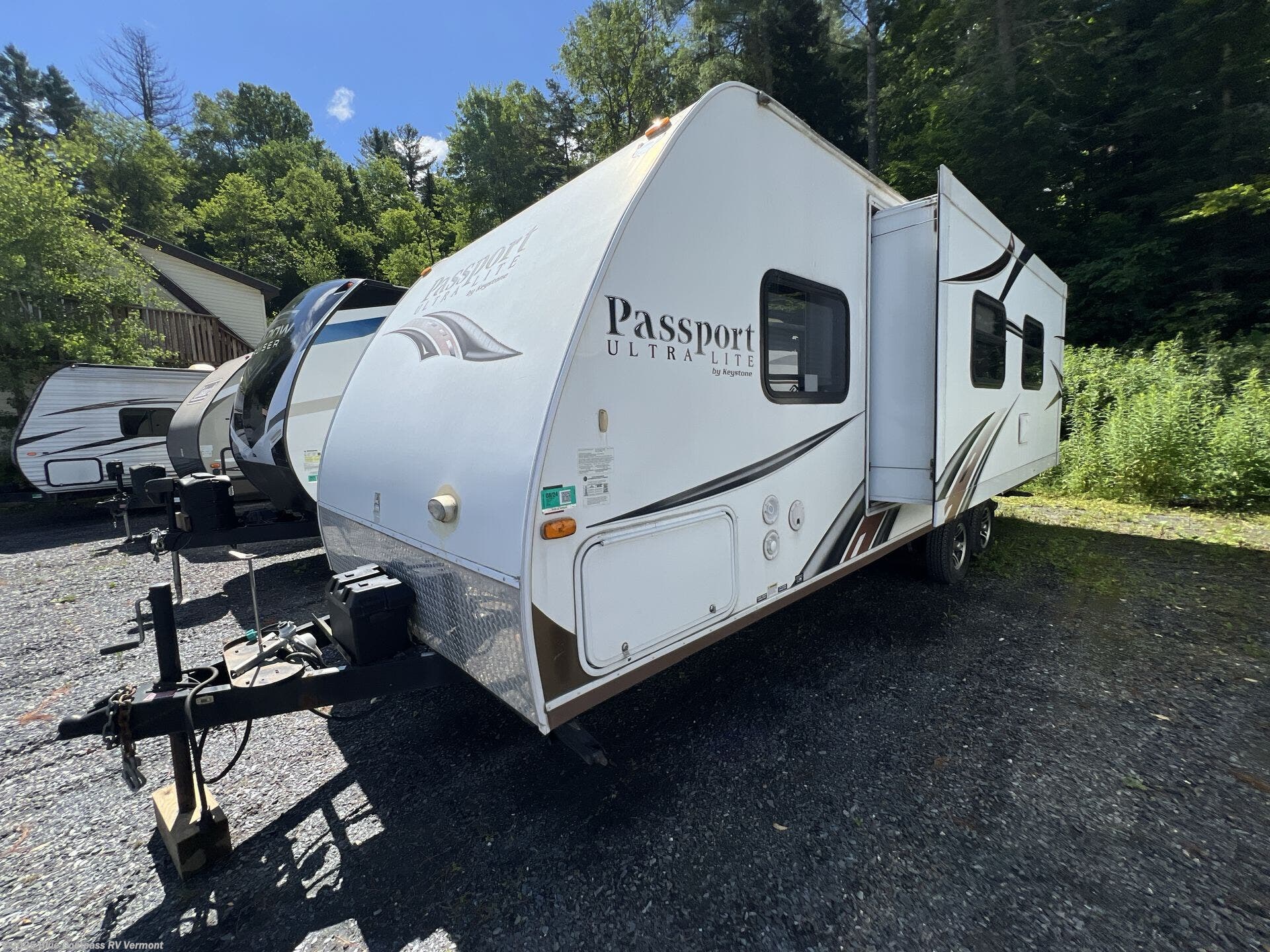 Contact us now about this 2014 Keystone Passport 245RB Express! 2014 Passport 245RB Express by Keystone from Blue Compass RV Vermont in East Montpelier, Vermont
