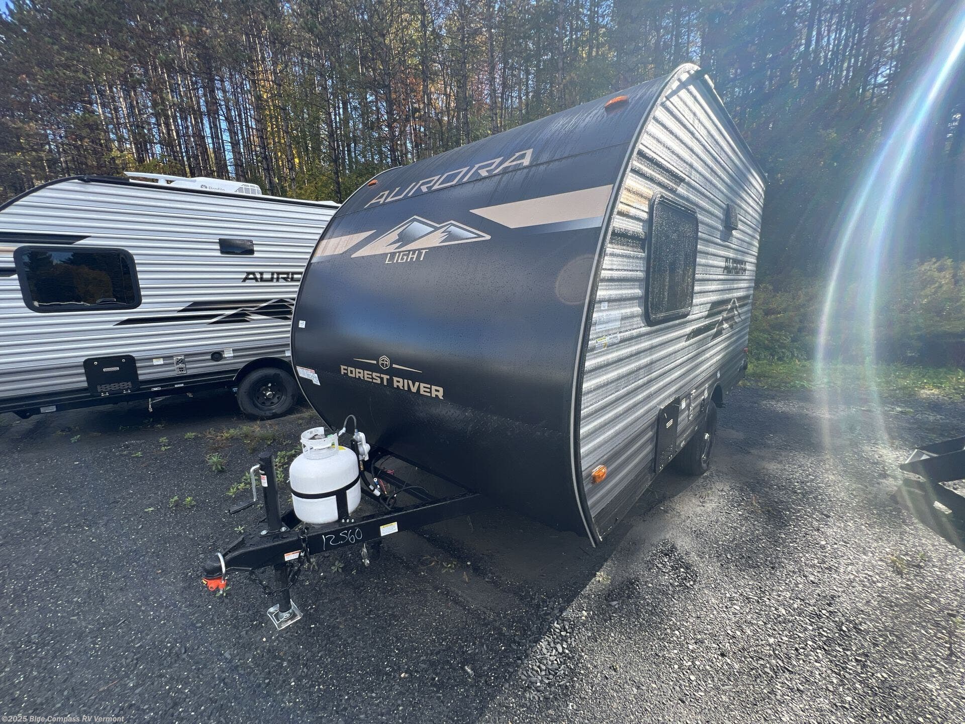 Contact us now about this 2026 Forest River Aurora Light 13RDX! 2026 Aurora Light 13RDX by Forest River from Blue Compass RV Vermont in East Montpelier, Vermont