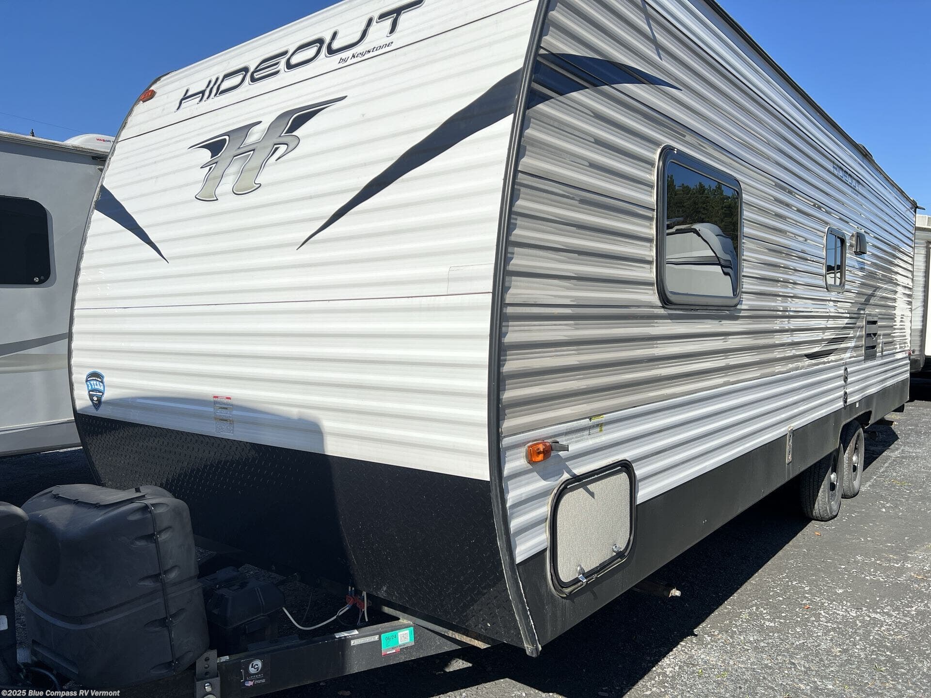 Contact us now about this 2019 Keystone Hideout 262LHS! 2019 Hideout 262LHS by Keystone from Blue Compass RV Vermont in East Montpelier, Vermont