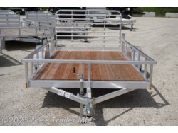 Legend 7x12 Open Deluxe Utility Trailer, 17" deck height utility trailer, 48" ramp gate trailer, 3.5k EZ-Lube spring axle, ST205/75R14 Silver Mod steel tires, 3" tube cross members, 24" on center cross member spacing, 4" tube frame trailer, aluminum flooring utility trailer, LED lighting trailer, 2" straight coupler, 2k top-wind jack, ATP fenders, stake pockets, aluminum utility trailer, open deluxe trailer, Legend utility trailer, lightweight utility trailer, durable trailer frame, trailer with LED lights, easy-to-lube axle, high-quality utility trailer, trailer with ramp gate, spring axle utility trailer, Legend trailer features, utility trailer with aluminum flooring, adjustable coupler trailer, top-wind jack utility trailer, trailer with ATP fenders, customizable utility trailer, Legend open trailer, utility trailer for heavy loads, trailer for equipment transport, low-profile utility trailer, trailer with stake pockets, utility trailer for landscaping, 12' utility trailer, trailer Legend 7x12 Open Deluxe Utility Trailer, 17" deck height utility trailer, 48" ramp gate trailer, 3.5k EZ-Lube spring axle, ST205/75R14 Silver Mod steel tires, 3" tube cross members, 24" on center cross member spacing, 4" tube frame trailer, aluminum flooring utility trailer, LED lighting trailer, 2" straight coupler, 2k top-wind jack, ATP fenders, stake pockets, aluminum utility trailer, open deluxe trailer, Legend utility trailer, lightweight utility trailer, durable trailer frame, trailer with LED lights, easy-to-lube axle, high-quality utility trailer, trailer with ramp gate, spring axle utility trailer, Legend trailer features, utility trailer with aluminum flooring, adjustable coupler trailer, top-wind jack utility trailer, trailer with ATP fenders, customizable utility trailer, Legend open trailer, utility trailer for heavy loads, trailer for equipment transport, low-profile utility trailer, trailer with stake pockets, utility trailer for landscaping, 12' utility trailer, trailer