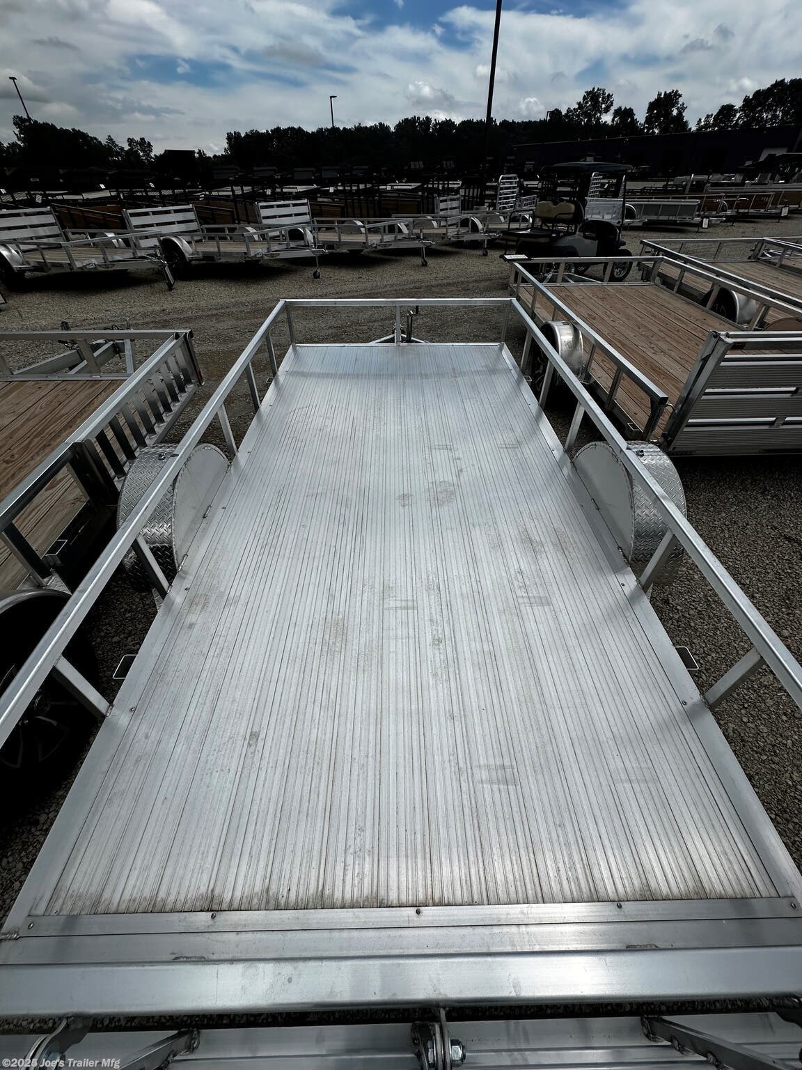 Legend 7X14' Open Deluxe Utility Trailer, 17" Deck Height Utility Trailer, 48" Bi Fold Ramp Gate Trailer, 3.5k EZ-Lube Spring Axle Trailer, ST205/75R14 Silver Mod Steel Tires, 3" Tube Cross Members Trailer, 24" On Center Cross Member Spacing, 4" Tube Frame Utility Trailer, Aluminum Flooring Trailer, LED Lighting Utility Trailer, 2" Straight Coupler Trailer, 2k Top-Wind Jack Utility Trailer, ATP Fenders Trailer, Stake Pockets Utility Trailer, Heavy Duty Utility Trailer, Open Utility Trailer 7X14, Deluxe Utility Trailer with Ramp Gate, Spring Axle Utility Trailer, Steel Tires Utility Trailer, Tube Cross Members Utility Trailer, Cross Member Spacing Utility Trailer, Tube Frame Trailer, Flooring Aluminum Trailer, LED Lights Utility Trailer, Coupler Trailer Parts, Top-Wind Jack Utility Trailer, Fenders ATP Utility Trailer, Stake Pockets Utility Trailer Features