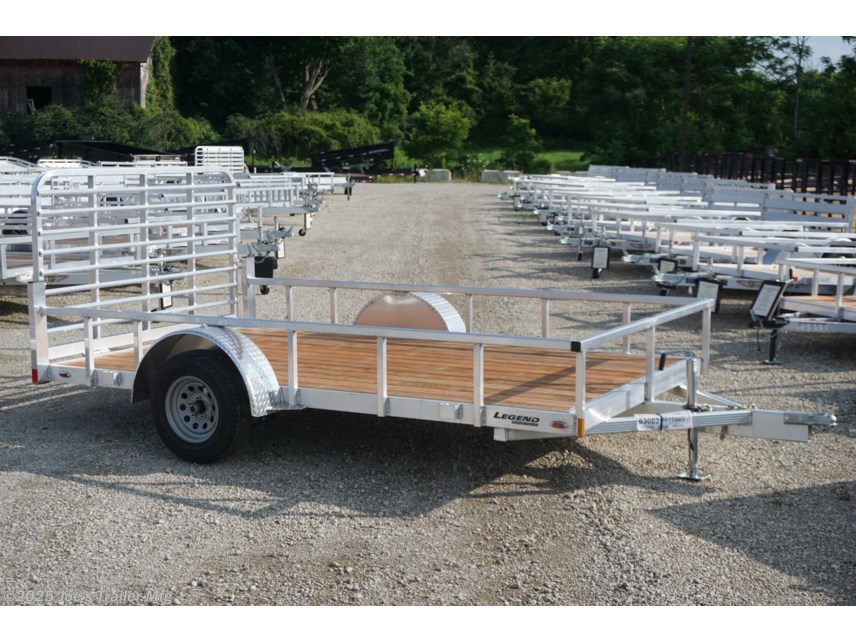 Legend 7X12' Open Deluxe Utility Trailer, 7X12 Utility Trailer, Legend Utility Trailer, Open Deluxe Utility Trailer, 17" Deck Height Trailer, 48" Ramp Gate Trailer, 3.5k EZ-Lube Spring Axle, EZ-Lube Spring Axle Trailer, ST205/75R14 Silver Mod Steel Tires, Silver Mod Steel Tires Trailer, 3" Tube Cross Members, 24" On Center Cross Member Spacing, 4" Tube Frame Trailer, treated wood decking trailer, LED Lighting Trailer, 2" Straight Coupler Trailer, 2k Top-Wind Jack, ATP Fenders Trailer, Stake Pockets Trailer, 7x12 Utility Trailer for Sale, Utility Trailer with Ramp Gate, Heavy-Duty Utility Trailer, Best Utility Trailer, Affordable Utility Trailer, Utility Trailer without Brakes, Durable Utility Trailer, Custom Utility Trailer, Utility Trailer with Treated Wood Decking, Utility Trailer with LED Lights, Utility Trailer with 2" Coupler, Utility Trailer with EZ-Lube Axle, Utility Trailer with Top-Wind Jack, Utility Trailer with ATP Fenders, Stake Pockets Utility Trailer, Trailer for Landscap Legend 7X12' Open Deluxe Utility Trailer, 7X12 Utility Trailer, Legend Utility Trailer, Open Deluxe Utility Trailer, 17" Deck Height Trailer, 48" Ramp Gate Trailer, 3.5k EZ-Lube Spring Axle, EZ-Lube Spring Axle Trailer, ST205/75R14 Silver Mod Steel Tires, Silver Mod Steel Tires Trailer, 3" Tube Cross Members, 24" On Center Cross Member Spacing, 4" Tube Frame Trailer, treated wood decking trailer, LED Lighting Trailer, 2" Straight Coupler Trailer, 2k Top-Wind Jack, ATP Fenders Trailer, Stake Pockets Trailer, 7x12 Utility Trailer for Sale, Utility Trailer with Ramp Gate, Heavy-Duty Utility Trailer, Best Utility Trailer, Affordable Utility Trailer, Utility Trailer without Brakes, Durable Utility Trailer, Custom Utility Trailer, Utility Trailer with Treated Wood Decking, Utility Trailer with LED Lights, Utility Trailer with 2" Coupler, Utility Trailer with EZ-Lube Axle, Utility Trailer with Top-Wind Jack, Utility Trailer with ATP Fenders, Stake Pockets Utility Trailer, Trailer for Landscap