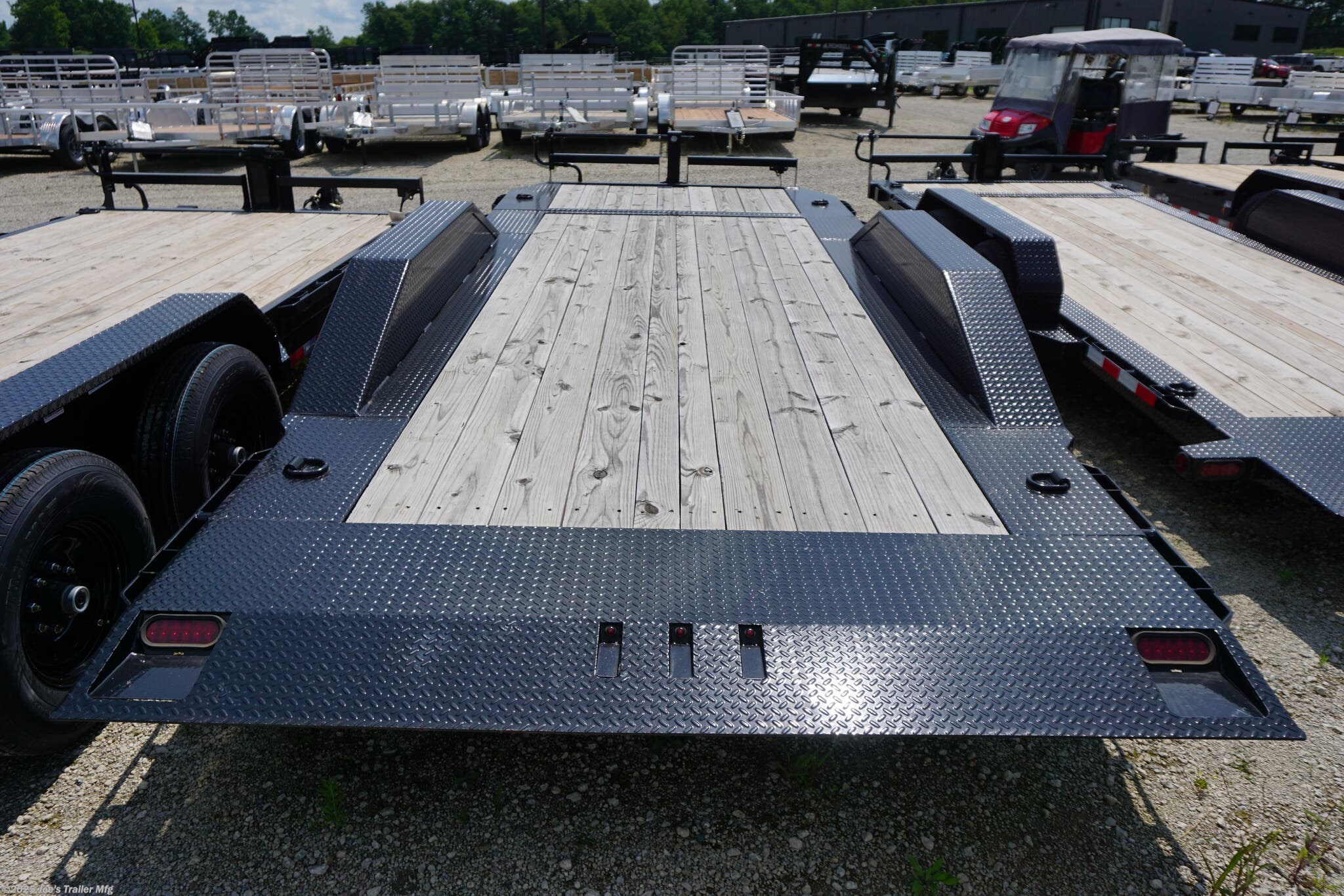 SEO Keywords: TLB 83 x 20 trailer, 83" x 20' trailer, 6" channel tongue, 20" deck height trailer, drive over fenders, knife edge tail trailer, 2" x 8" treated pine floor, 11 degree loading angle, 7000 lb torsion axles, dual 7000 lb torsion axles, 10k drop-leg jack, heavy-duty drop-leg jack, 7-way receiver female plug with adapter, trailer with brakes, rub rail and stake pockets, 3" d-rings, four d-rings, E-Z lube hub, lifetime LED lighting, trailer with molded sealed harness, harness with resistors, powdura powder coat, one cure primer, durable trailer coating, protected trailer finish, TLB 83 x 20 utility trailer, heavy-duty utility trailer, trailer with treated pine floor, torsion axles trailer, trailer with drive over fenders, trailer with knife edge tail, trailer with LED lighting, trailer with rub rail, heavy-duty trailer suspension, high-capacity trailer axles, drop-leg jack for trailers, secure load management trailer, trailer with sealed wiring, corrosion-resistant trailer, pow