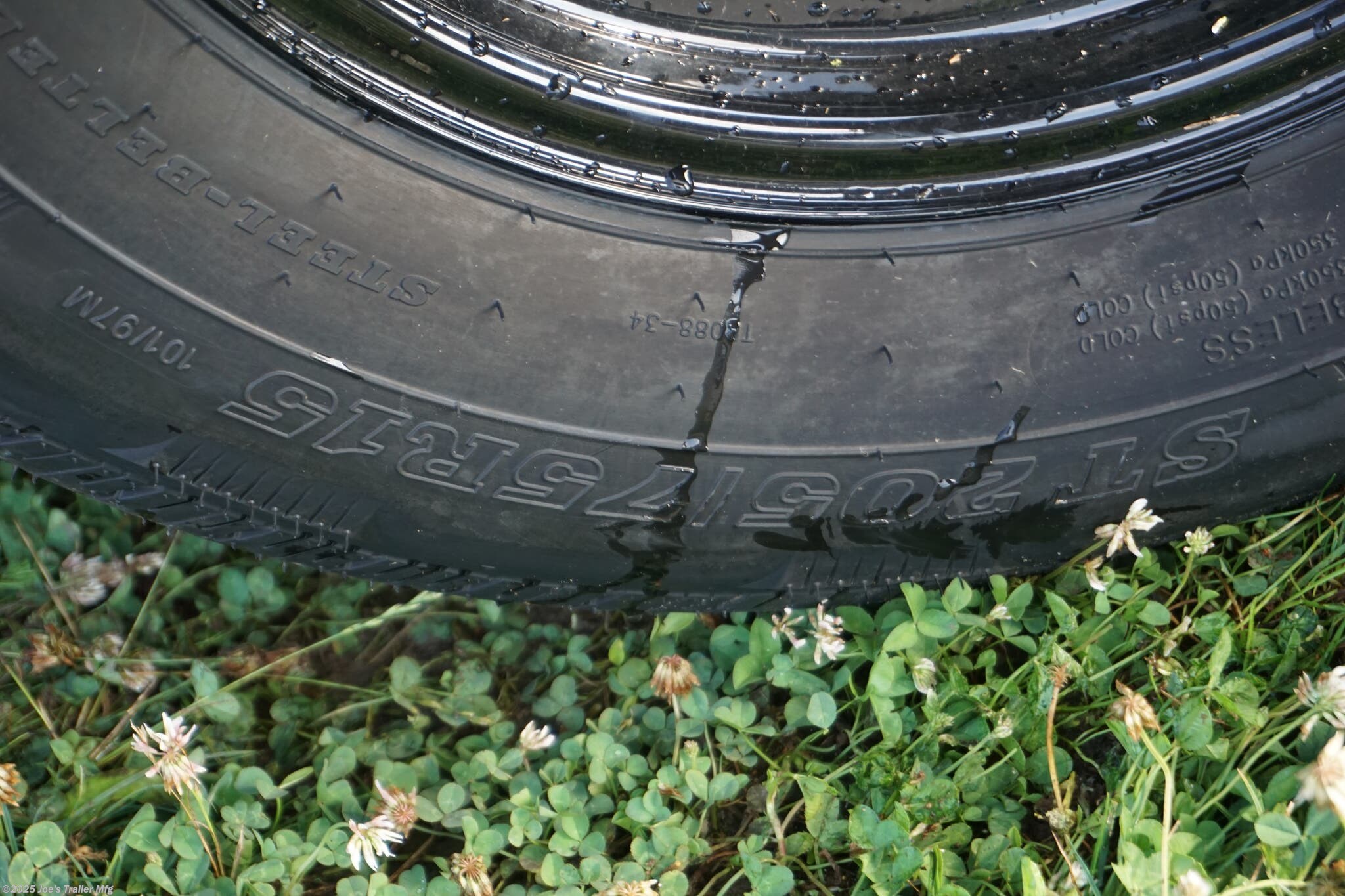 82x20 Tandem Solid Side, 12-Gauge Steel Frame, Steel Angle Crossmembers, 12-Gauge Steel Sides, 15" Tall, 4" Steel Channel Tongue, A-Frame Posi-lock Coupler, Dual Safety Chains and Hooks, 2K Rated Set-Back Jack with Foot, 2x8 Treated, #1 Grade Wood Decking, Welded Front Board Retainer, Welded Rear End Cap, 50" Spring Assisted Gate, Grab Handle, Steel Tread Plate Fenders, Spring Suspension, Easy Lube Hubs, Radial Tires, Black Steel Wheels, Enclosed Sealed Wiring Harness, Full LED Lighting, DOT Compliant Lighting, D-Rings Tie Downs, Spare Tire Mount, Load Angle, Ramp Length, Load Angle: 22°, Ramp Length: 50", ramp pivot point, heavy-duty trailer, utility trailer, equipment trailer, tandem axle trailer, solid side trailer, durable trailer, trailer safety features, easy maintenance trailer, wood decking trailer, radial tire trailer, LED lighting trailer, steel frame trailer, spring suspension trailer, A-frame coupler, safety chains, set-back jack, treated wood decking, spring assisted gate,