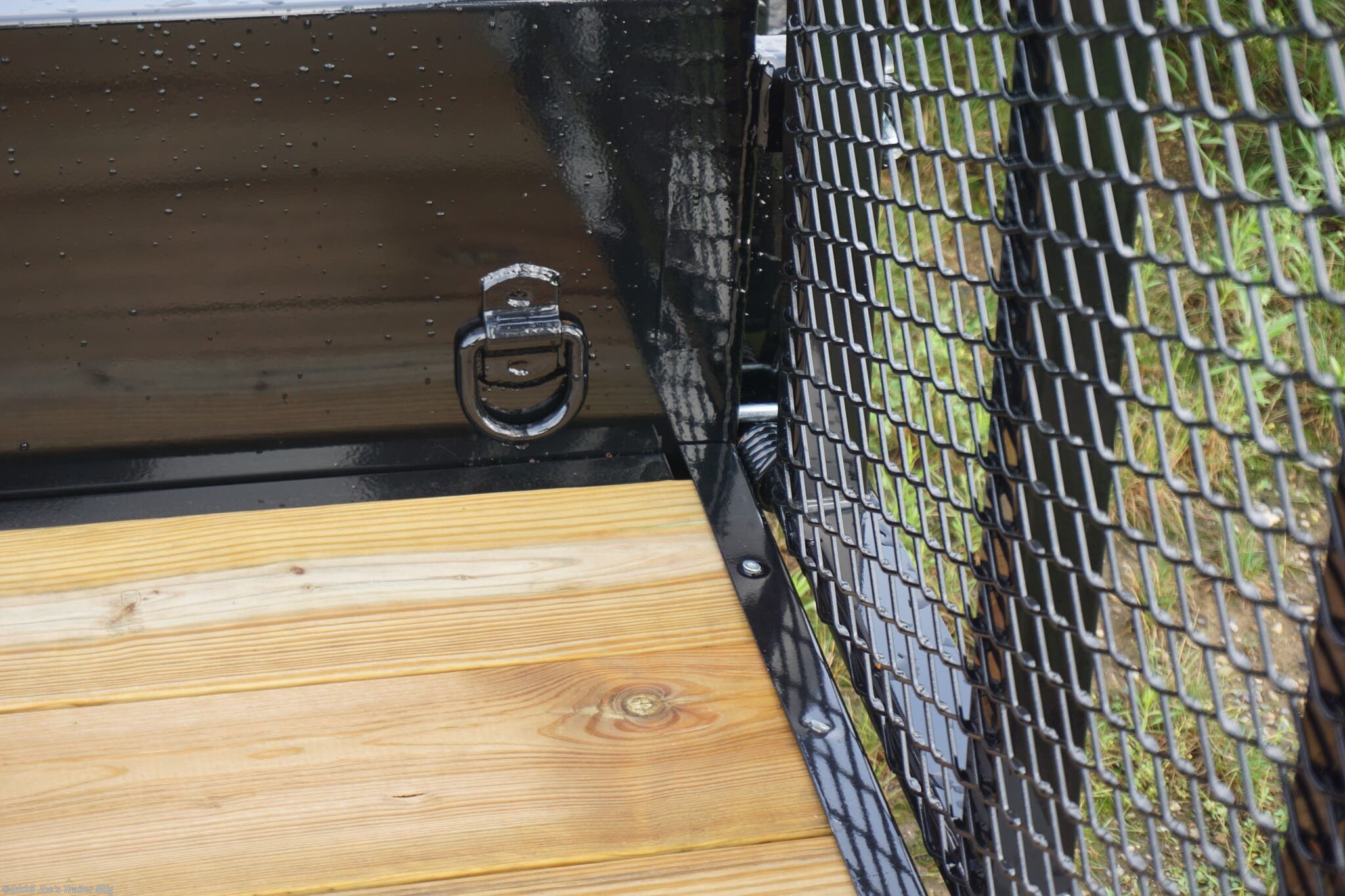 82x20 Tandem Solid Side, 12-Gauge Steel Frame, Steel Angle Crossmembers, 12-Gauge Steel Sides, 15" Tall, 4" Steel Channel Tongue, A-Frame Posi-lock Coupler, Dual Safety Chains and Hooks, 2K Rated Set-Back Jack with Foot, 2x8 Treated, #1 Grade Wood Decking, Welded Front Board Retainer, Welded Rear End Cap, 50" Spring Assisted Gate, Grab Handle, Steel Tread Plate Fenders, Spring Suspension, Easy Lube Hubs, Radial Tires, Black Steel Wheels, Enclosed Sealed Wiring Harness, Full LED Lighting, DOT Compliant Lighting, D-Rings Tie Downs, Spare Tire Mount, Load Angle, Ramp Length, Load Angle: 22°, Ramp Length: 50", ramp pivot point, heavy-duty trailer, utility trailer, equipment trailer, tandem axle trailer, solid side trailer, durable trailer, trailer safety features, easy maintenance trailer, wood decking trailer, radial tire trailer, LED lighting trailer, steel frame trailer, spring suspension trailer, A-frame coupler, safety chains, set-back jack, treated wood decking, spring assisted gate,