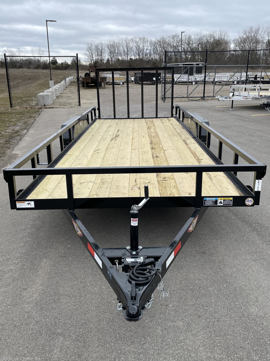 H&H 82" x 18' Landscape/Utility Trailer, H&H Utility Trailer, H&H Landscape Trailer, H&H 82x18 Trailer, 82x18 Utility Trailer, 82x18 Landscape Trailer, Steel Angle Frame Trailer, 3" x 2" Steel Angle Frame, 4" x 3" Steel Angle Frame, Steel Crossmembers, Steel Channel Tongue, Steel Tube Uprights, Steel Tube Top Rail, A-Frame Posi-Lock Coupler, 2" A-Frame Coupler, 2-5/16" A-Frame Coupler, Single Axle Trailer, Tandem Axle Trailer, Dual Safety Chains, Safety Chains and Hooks, 4-Prong Plug, 7-Way RV Plug, Enclosed Wiring Harness, Setback Jack with Foot, Spring Assisted Gate, Tall Spring Gate, Grab Handle, Radius Tread Plate Fenders, Steel Tread Plate Fenders, Spring Idler Suspension, Tandem Spring Brake Suspension, Easy Lube Hubs, ST205/75R15 C Tires, 15" Black Steel Wheels, Powder Coat Finish, Pressure Treated Pine Decking, Welded Front Board Retainer, Rear End Board Cap, Stake Pockets, Spare Tire Mount, Full LED Lighting, DOT Compliant Lighting, Load Angle Ramp Length, 22° Load Angle, 50"