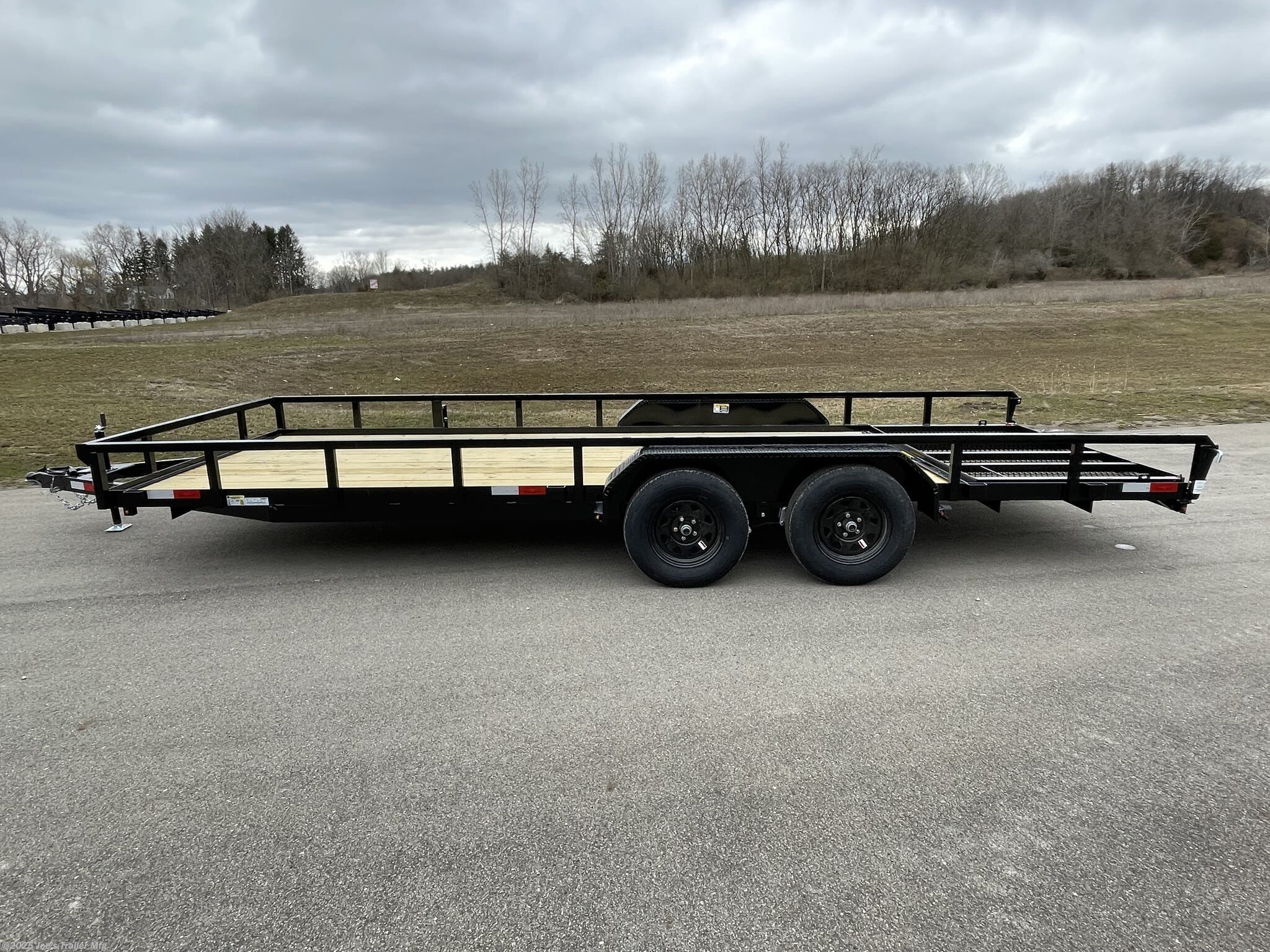 H&H 82" x 18' Landscape/Utility Trailer, H&H Utility Trailer, H&H Landscape Trailer, H&H 82x18 Trailer, 82x18 Utility Trailer, 82x18 Landscape Trailer, Steel Angle Frame Trailer, 3" x 2" Steel Angle Frame, 4" x 3" Steel Angle Frame, Steel Crossmembers, Steel Channel Tongue, Steel Tube Uprights, Steel Tube Top Rail, A-Frame Posi-Lock Coupler, 2" A-Frame Coupler, 2-5/16" A-Frame Coupler, Single Axle Trailer, Tandem Axle Trailer, Dual Safety Chains, Safety Chains and Hooks, 4-Prong Plug, 7-Way RV Plug, Enclosed Wiring Harness, Setback Jack with Foot, Spring Assisted Gate, Tall Spring Gate, Grab Handle, Radius Tread Plate Fenders, Steel Tread Plate Fenders, Spring Idler Suspension, Tandem Spring Brake Suspension, Easy Lube Hubs, ST205/75R15 C Tires, 15" Black Steel Wheels, Powder Coat Finish, Pressure Treated Pine Decking, Welded Front Board Retainer, Rear End Board Cap, Stake Pockets, Spare Tire Mount, Full LED Lighting, DOT Compliant Lighting, Load Angle Ramp Length, 22° Load Angle, 50"