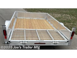 Legend Open Deluxe 7X12 Utility Trailer, 4" Tube Main Frame Utility Trailer, 24" OC Crossmembers Trailer, 15" Side Rails With Skirting, 2" Coupler Trailer, ST205/75R14 Steel Tires Trailer, ATP Fenders Utility Trailer, Treated Wood Decking Trailer, (4) Stake Pockets Utility Trailer, No Brakes Utility Trailer, Load Angle 19° Trailer, Ramp Length 48" Trailer, Ramp Pivot Point Trailer, Heavy Duty Utility Trailer, Durable Utility Trailer, Steel Tires Utility Trailer, Tubular Frame Trailer, Crossmembers Spacing 24" Trailer, Side Rails With Skirting Utility Trailer, Coupler 2" Trailer, Aluminum Fenders Utility Trailer, Wood Decking Treated, Stake Pockets 4 Trailer, Trailer Without Brakes, Load Angle 19 Degrees, Ramp Length 48 Inches, Utility Trailer Specs, Trailer Features, Utility Trailer Specifications, Legend Trailer Features, Deluxe Utility Trailer, Open Utility Trailer Legend Open Deluxe 7X12 Utility Trailer, 4" Tube Main Frame Utility Trailer, 24" OC Crossmembers Trailer, 15" Side Rails With Skirting, 2" Coupler Trailer, ST205/75R14 Steel Tires Trailer, ATP Fenders Utility Trailer, Treated Wood Decking Trailer, (4) Stake Pockets Utility Trailer, No Brakes Utility Trailer, Load Angle 19° Trailer, Ramp Length 48" Trailer, Ramp Pivot Point Trailer, Heavy Duty Utility Trailer, Durable Utility Trailer, Steel Tires Utility Trailer, Tubular Frame Trailer, Crossmembers Spacing 24" Trailer, Side Rails With Skirting Utility Trailer, Coupler 2" Trailer, Aluminum Fenders Utility Trailer, Wood Decking Treated, Stake Pockets 4 Trailer, Trailer Without Brakes, Load Angle 19 Degrees, Ramp Length 48 Inches, Utility Trailer Specs, Trailer Features, Utility Trailer Specifications, Legend Trailer Features, Deluxe Utility Trailer, Open Utility Trailer