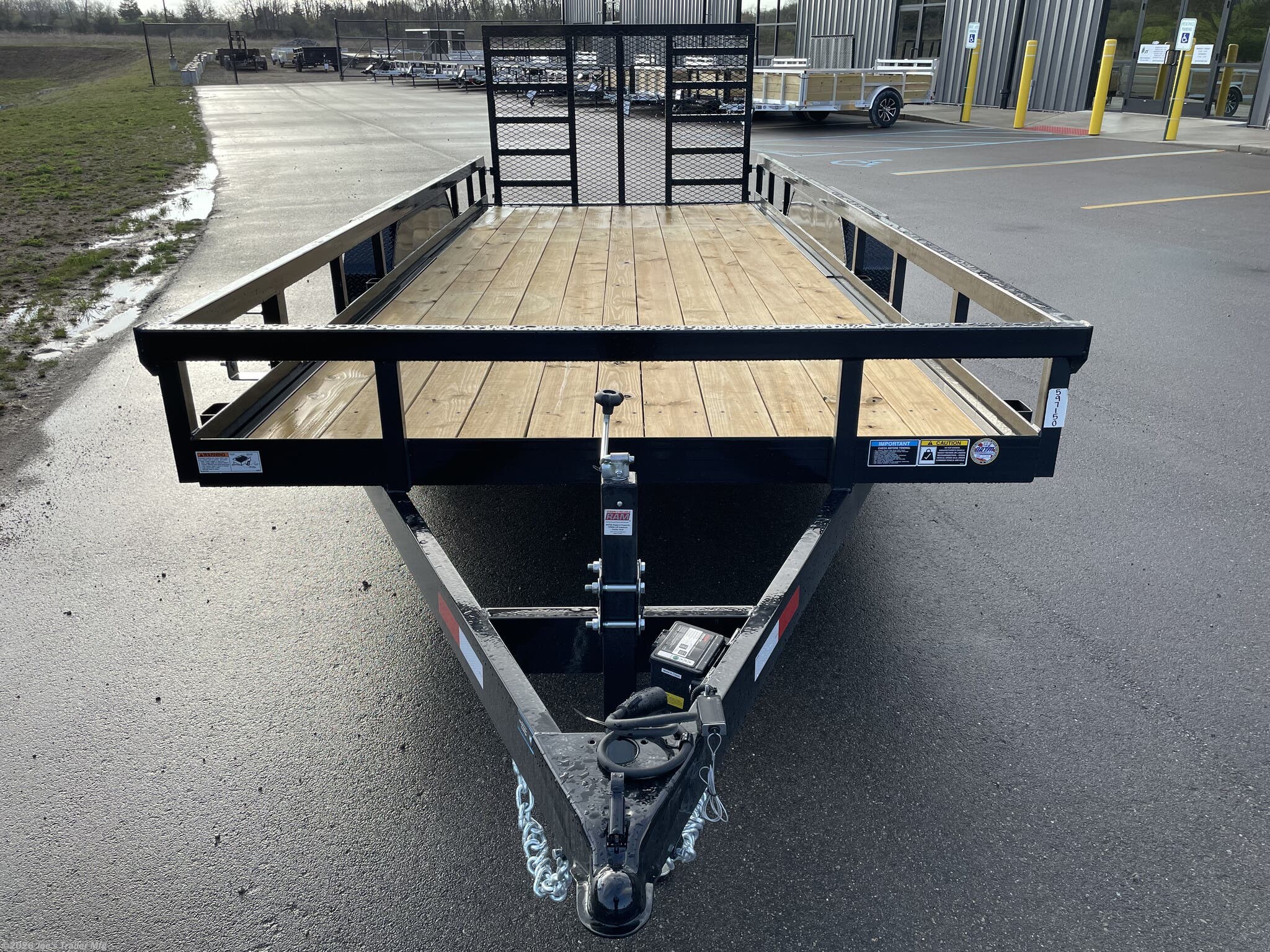 H&H 82" x 18' Heavy Duty Landscape/Utility Trailer, 5" x 3" x 1/4" Steel Angle Frame, 3" x 2" x 3/16" Steel Angle Crossmembers, 5" Steel Channel Tongue, Fully Wrapped, 3" x 2" Steel Tube Top Rail, 2-5/16" A-Frame Posi-Lock Coupler, Dual Safety Chains and Hooks, 7-Way RV-Style Plug, Enclosed Sealed Wiring Harness, 7k Rated Setback Drop Leg Jack, 50" Tall Reinforced Spring Assist Gate, Ladder Style Gate, Steel Formed Tread Plate Fenders, Tandem Spring Brake Suspension, 9900 lb GVWR, Easy Lube Hubs, ST225/75R15 'D' Tires, 15" Black Steel Wheels, Industrial Grade Polymer Finish, 2 x 8 Pressure Treated Pine Decking, Welded Front Board Retainer, Rear End Board Cap, Stake Pockets, Spare Tire Mount, Full LED DOT Compliant Lighting, Heavy Duty Landscape Trailer, Utility Trailer with Steel Frame, Steel Angle Crossmembers Trailer, Heavy Duty Trailer with Spring Assist Gate, Tandem Brake Suspension Trailer, Pressure Treated Pine Deck Utility Trailer, Steel Tube Top Rail Trailer, DOT Compliant Trai