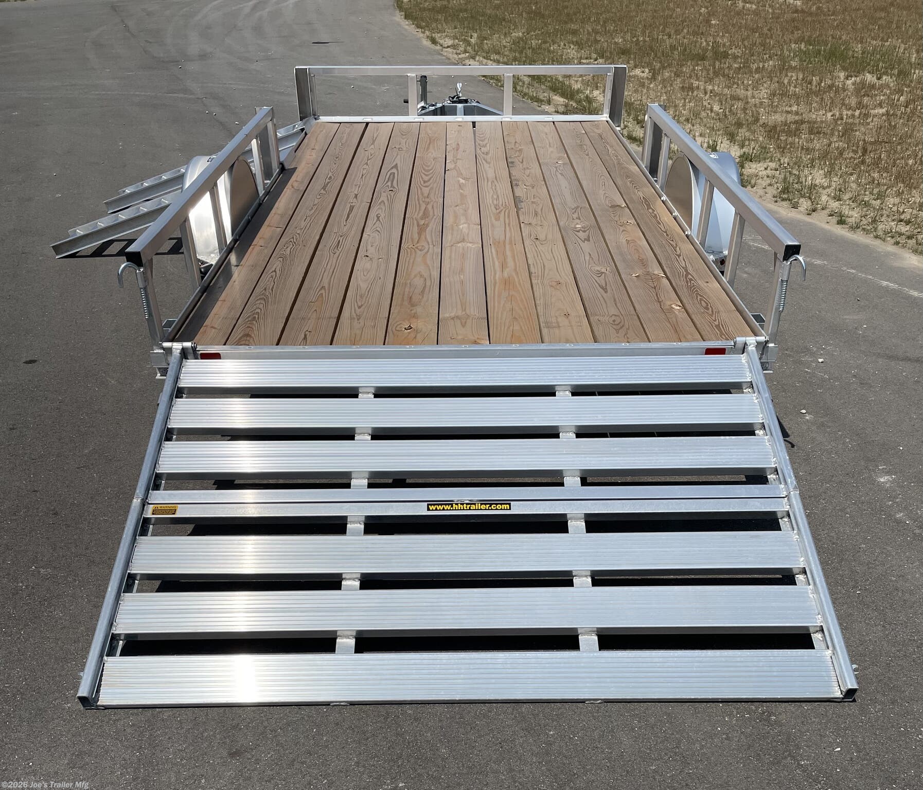 H&H 82"X14' Single Axle Utility Trailer, H&H trailer, single axle utility trailer, 82"X14' trailer, utility trailer, 3"x2" angle cross members, angle cross members, 3"x2" angle frame, angle frame, 2" A frame tongue, A frame tongue, 17.5" deck height, deck height, 1K swivel jack, swivel jack, 3K spring axle, spring axle, 15" radial load range C aluminum wheels, radial load range C wheels, aluminum wheels, ST205/75R15 wheels, LED lighting, LED trailer lights, pressure treated pine decking, pine decking, bi-fold gate, bi-fold ramp, removable side mounted ramps, side mounted ramps, trailer ramps, H&H trailer features, H&H trailer specifications, utility trailer features, utility trailer specifications, single axle trailer benefits, durable trailer, reliable utility trailer, trailer with LED lights, trailer with aluminum wheels, trailer with pressure treated decking, trailer with bi-fold gate, trailer with removable ramps.