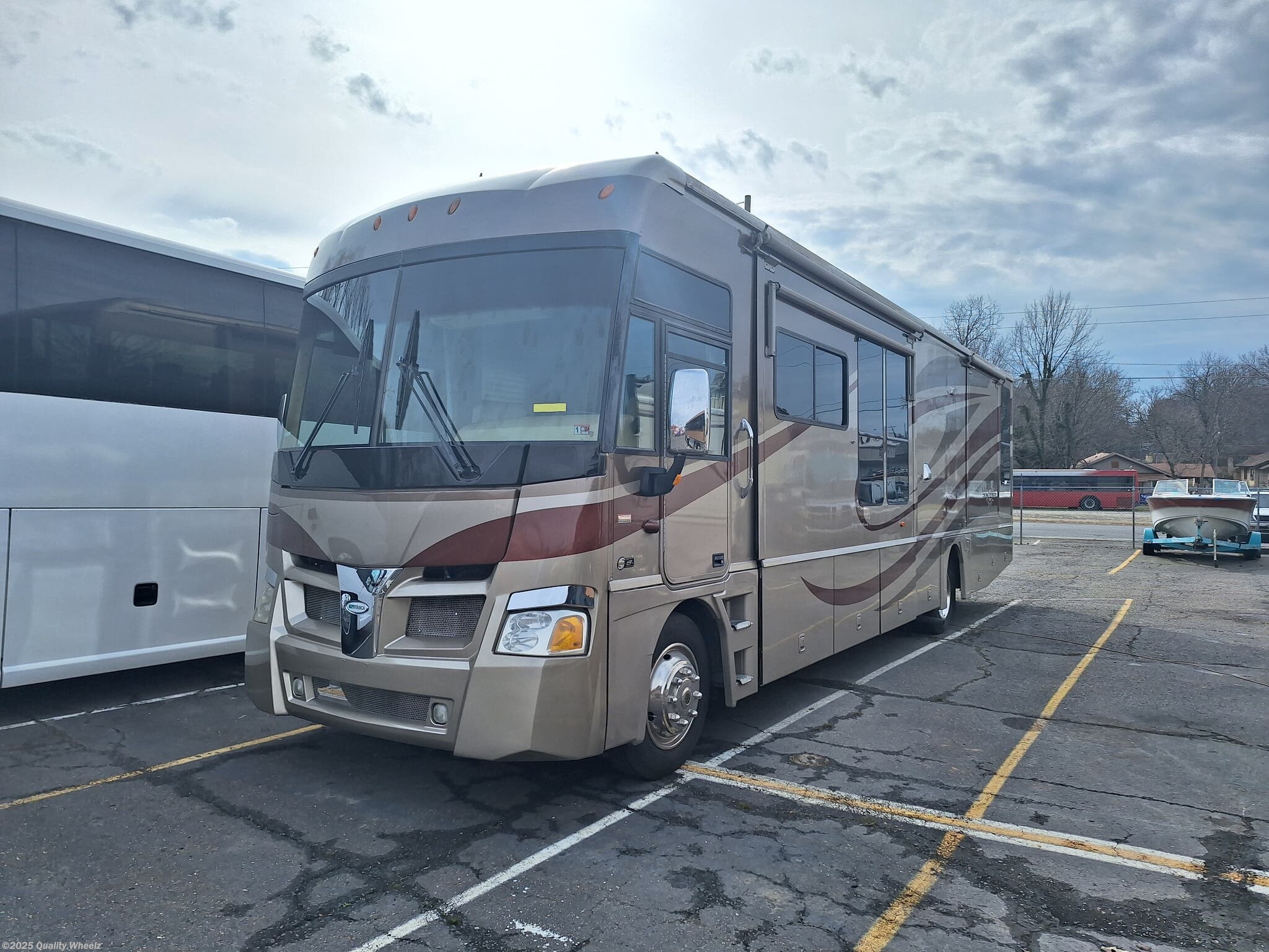 Call now about this 2006 Winnebago Suncruiser 38j! 2006 Winnebago Suncruiser 38j - New Class A For Sale by Quality Wheelz in Hot Springs, Arkansas features Backup Monitor, Awning, External Shower, TV, Skylight