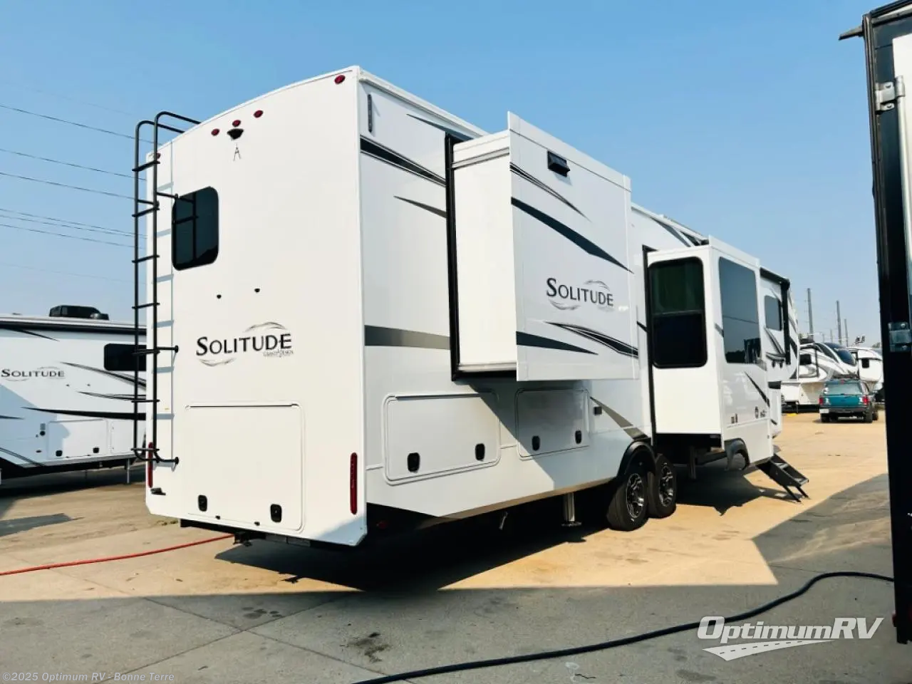 Call now about this 2025 Grand Design Solitude 390RK! 2025 Grand Design Solitude 390RK - New Fifth Wheel For Sale by Optimum RV - Bonne Terre in Bonne Terre, Missouri features Slideout, Awning