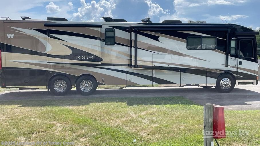 Call now about this 2013 Winnebago Tour 42QD! 2013 Winnebago Tour 42QD - Used Class A For Sale by Lazydays RV of Turkey Creek in Knoxville, Tennessee