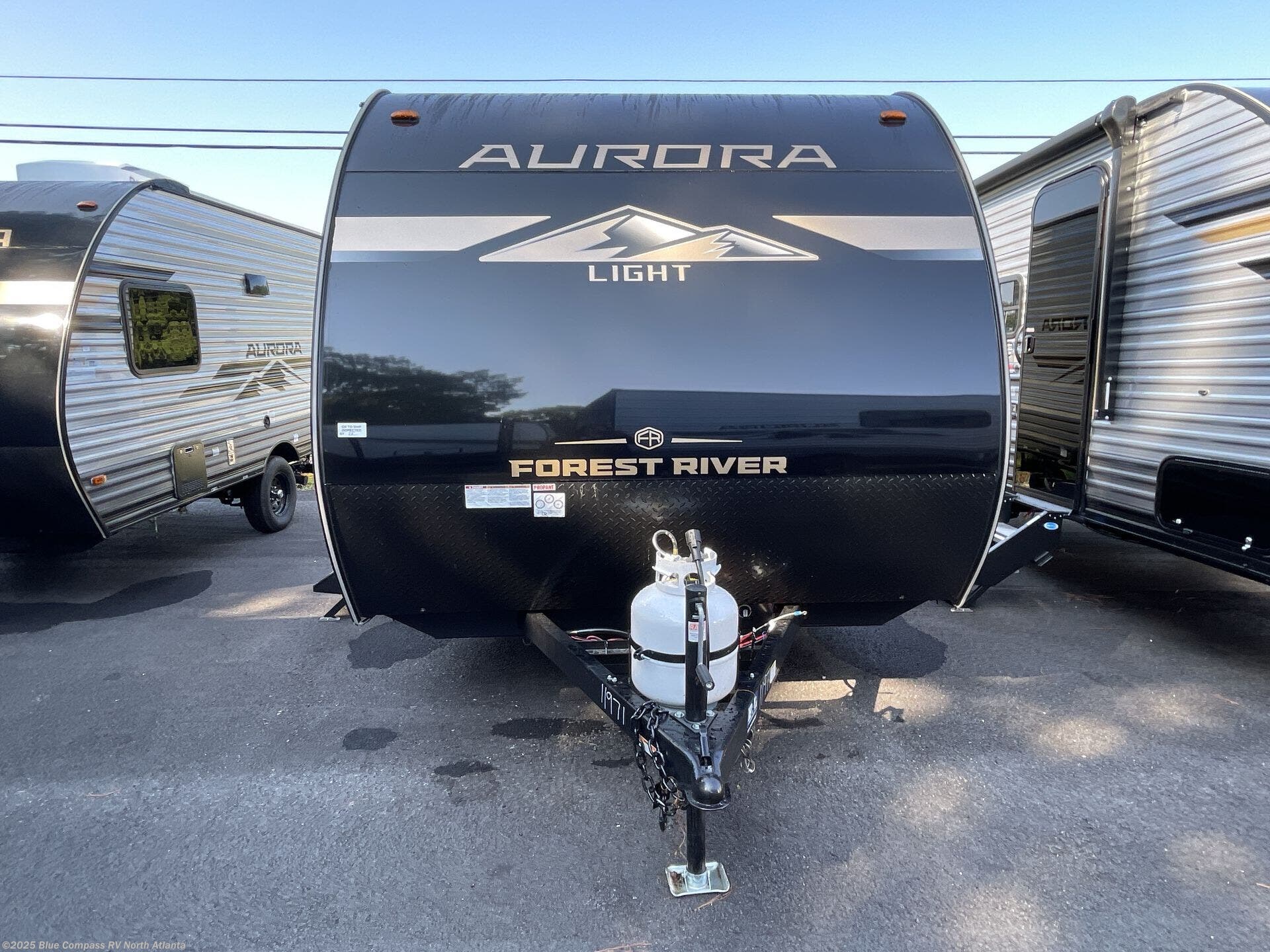 Contact us now about this 2026 Forest River Aurora Light 16BHX! 2026 Aurora Light 16BHX by Forest River from Blue Compass RV North Atlanta in Buford, Georgia