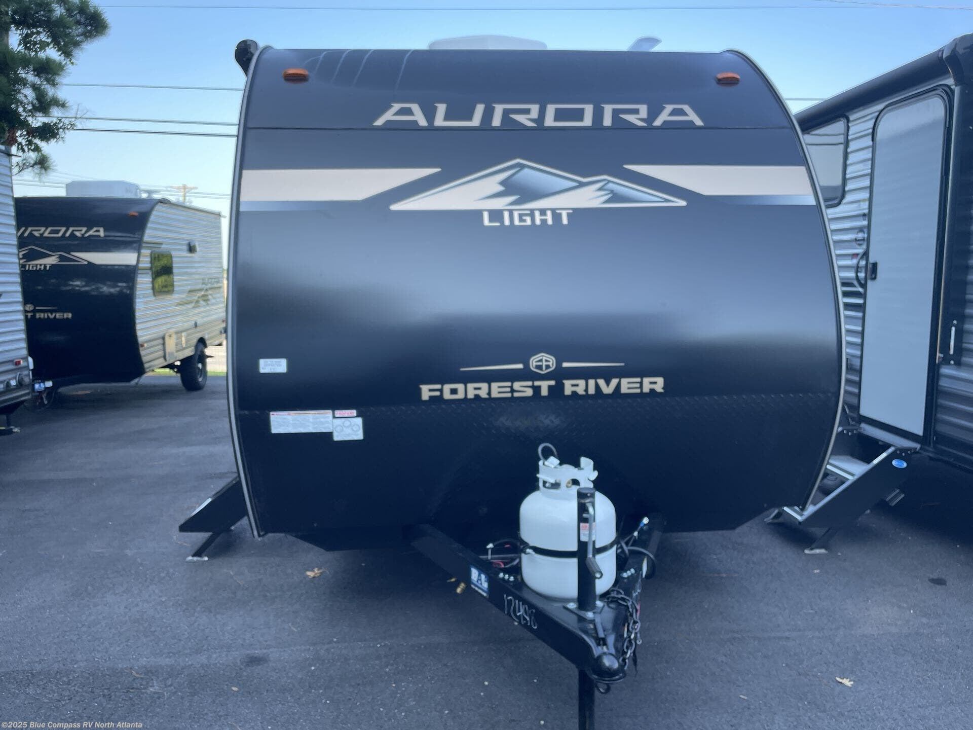 Contact us now about this 2026 Forest River Aurora Light 13RDX! 2026 Aurora Light 13RDX by Forest River from Blue Compass RV North Atlanta in Buford, Georgia