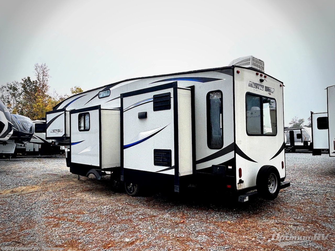 Contact us now about this 2019 Forest River Cherokee Arctic Wolf 295QSL8! 2019 Cherokee Arctic Wolf 295QSL8 by Forest River from Optimum RV - Tallahassee in Tallahassee, Florida