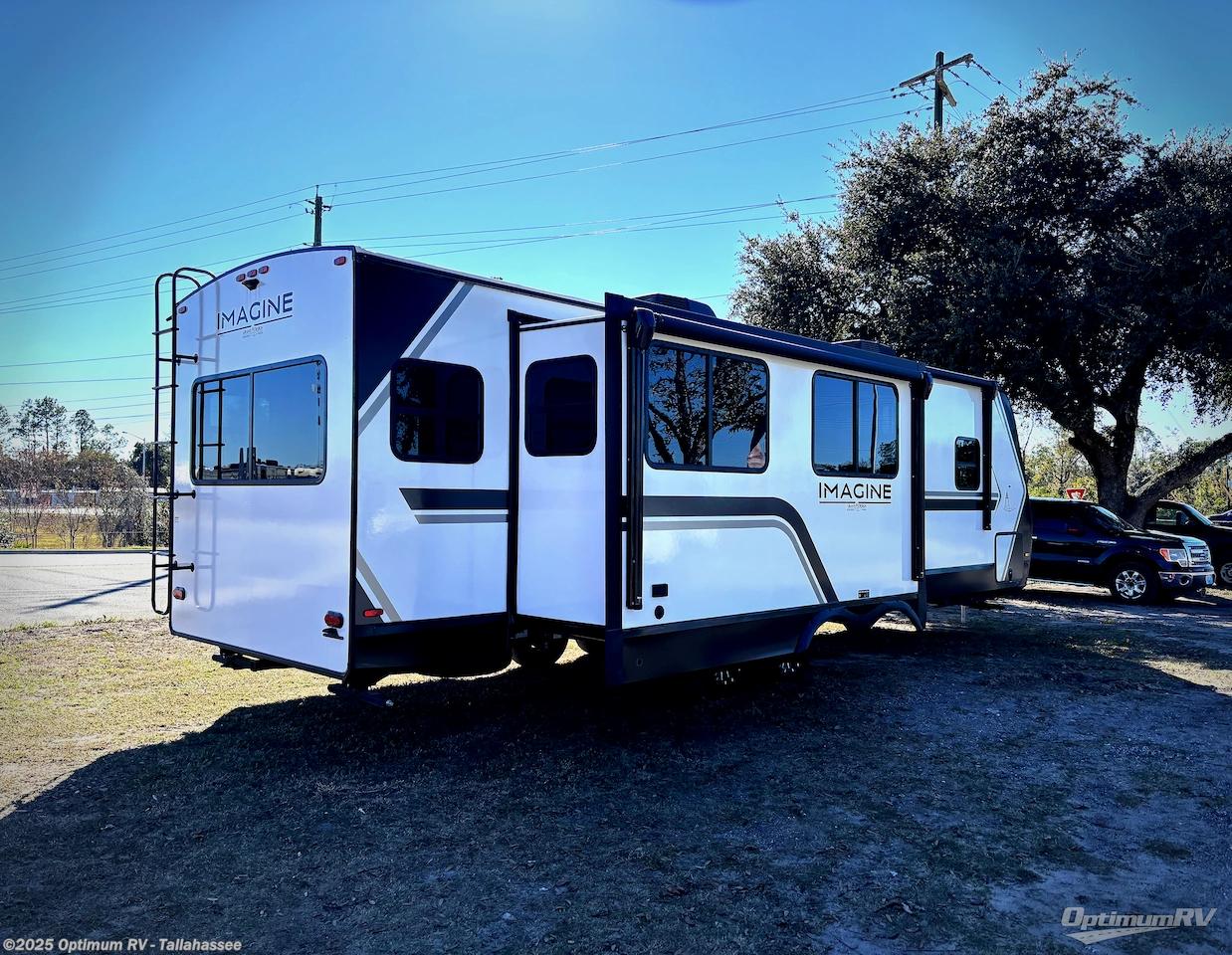 Call now about this 2026 Grand Design Imagine 2970RL! 2026 Grand Design Imagine 2970RL - New Travel Trailer For Sale by Optimum RV - Tallahassee in Tallahassee, Florida features Awning, Slideout