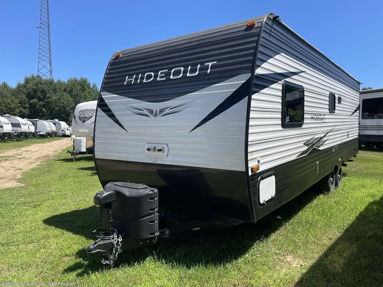 Contact us now about this 2021 Keystone Hideout 262BH! 2021 Hideout 262BH by Keystone from Fun Town RV - North Detroit in North Branch, Michigan
