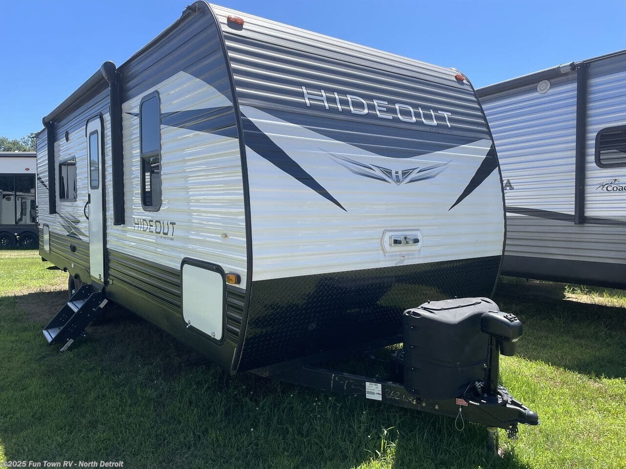 Call now about this 2021 Keystone Hideout 262BH! 2021 Keystone Hideout 262BH - Used Travel Trailer For Sale by Fun Town RV - North Detroit in North Branch, Michigan