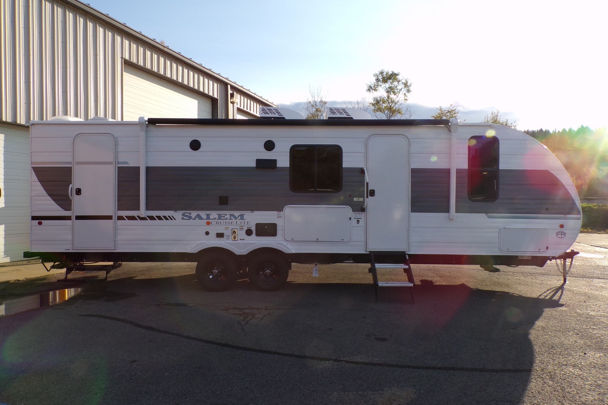 Call now about this 2026 Forest River Salem Cruise Lite 263BHXL! 2026 Forest River Salem Cruise Lite 263BHXL - New Travel Trailer For Sale by Hometown RV LLC in Brockway, Pennsylvania features PVC Roof, Stove Top Burner, Shower, 50 Amp Service, Propane