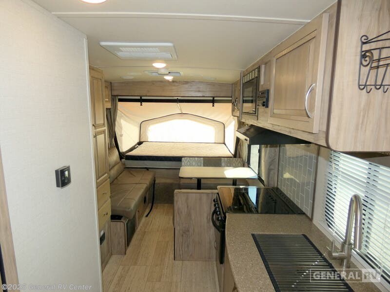 Call now about this 2019 Palomino 163X! 2019 Palomino 163X - Used Expandable Trailer For Sale by General RV Center in Longmont, Colorado