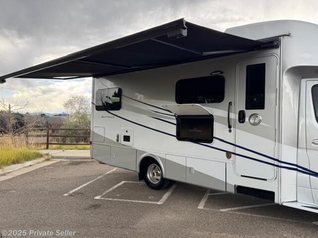 Power awning automatically retracts in high wind