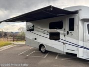 Power awning automatically retracts in high wind